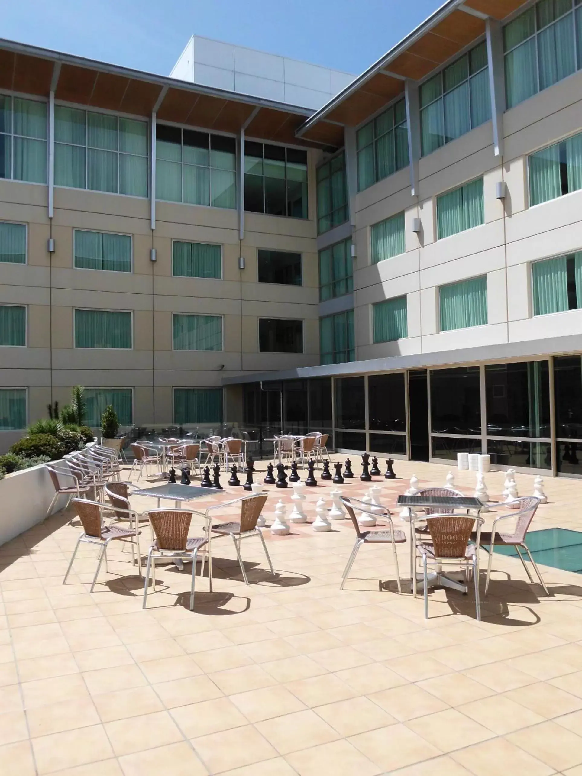 Patio, Swimming Pool in Novotel Tainui Hamilton