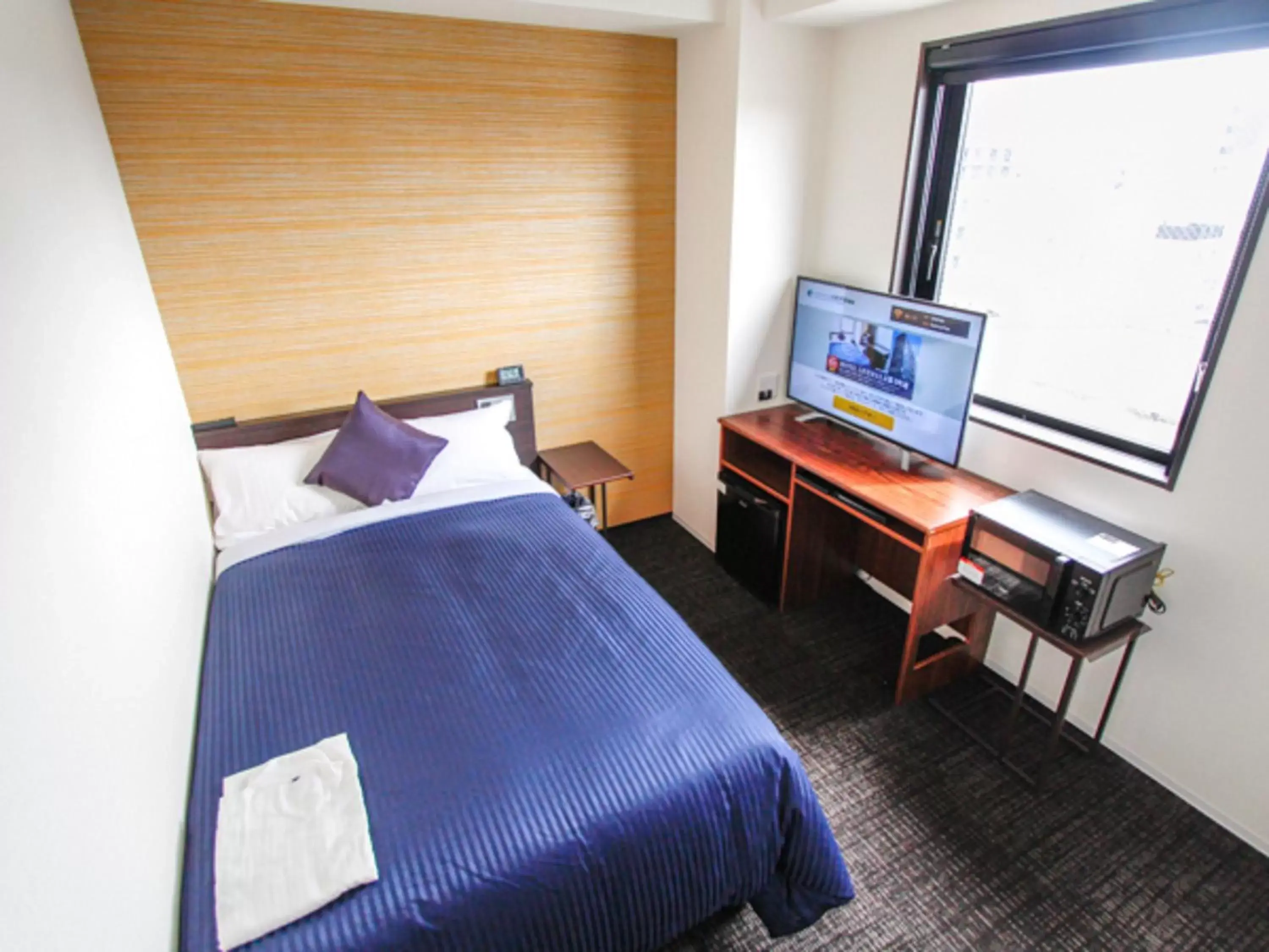 Bed in HOTEL LiVEMAX Kyoto Teramachidori
