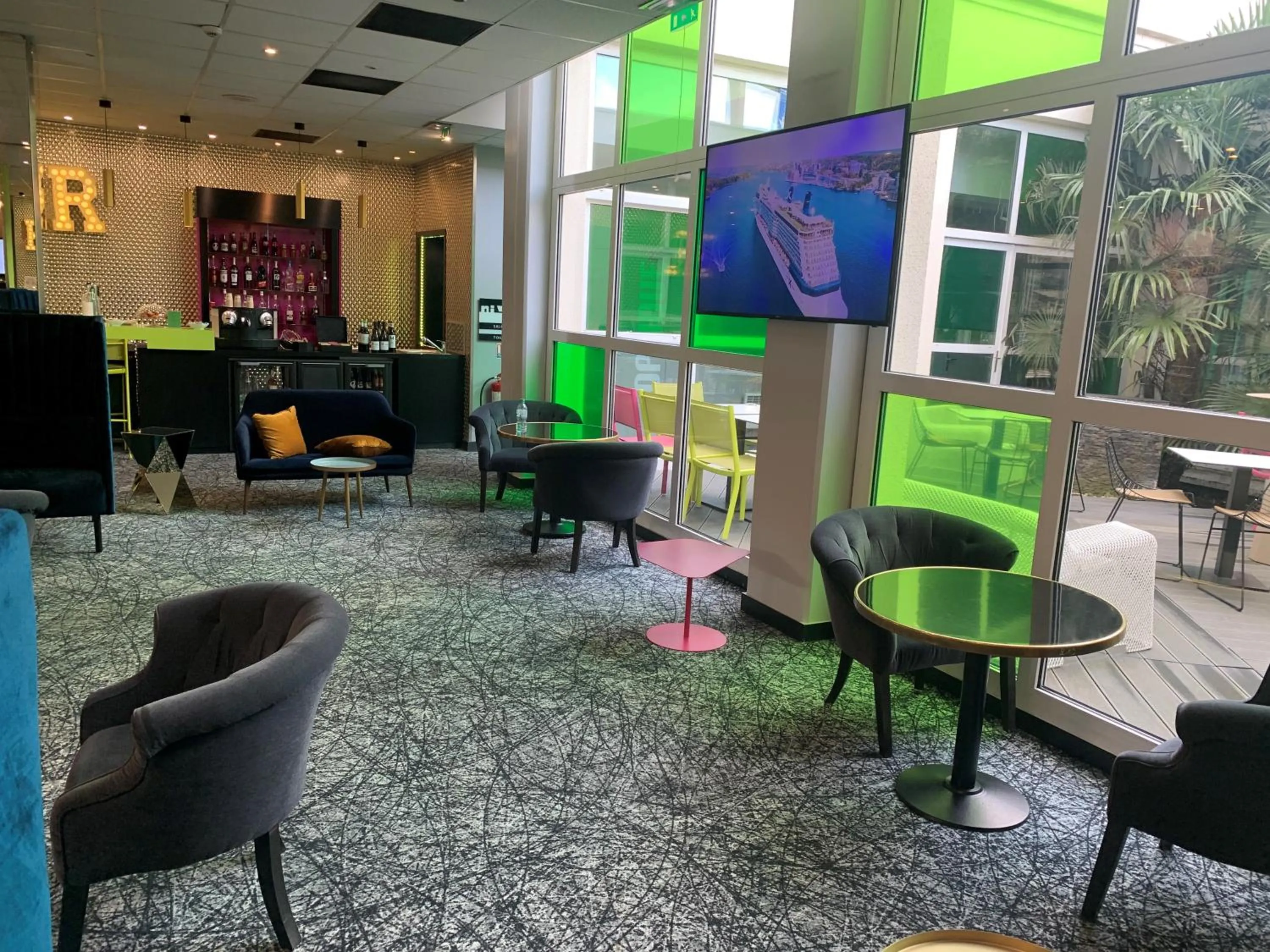 Communal lounge/ TV room in ibis Styles Antony Paris Sud