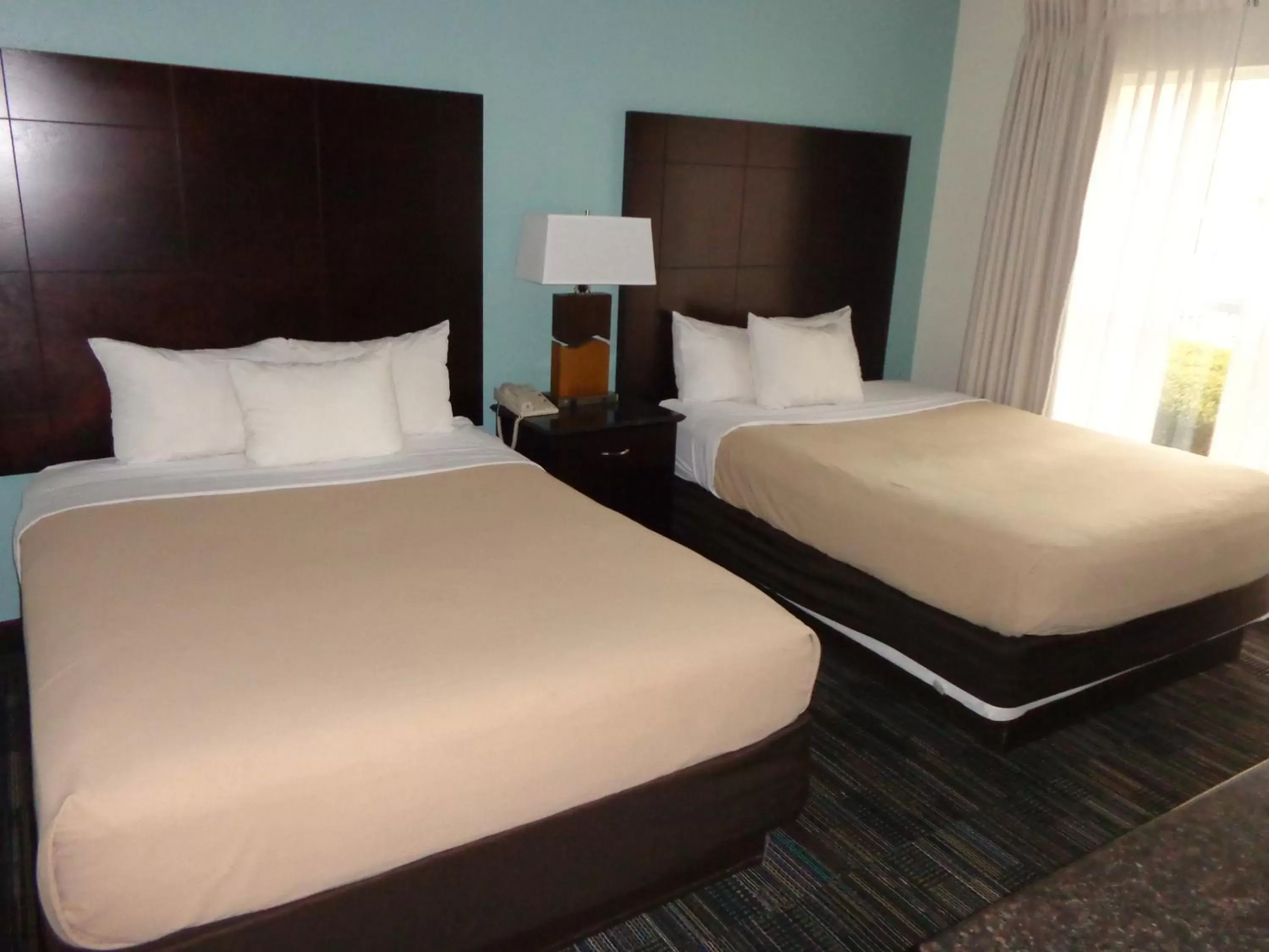 Bedroom, Bed in SureStay Plus by Best Western Orlando Lake Buena Vista