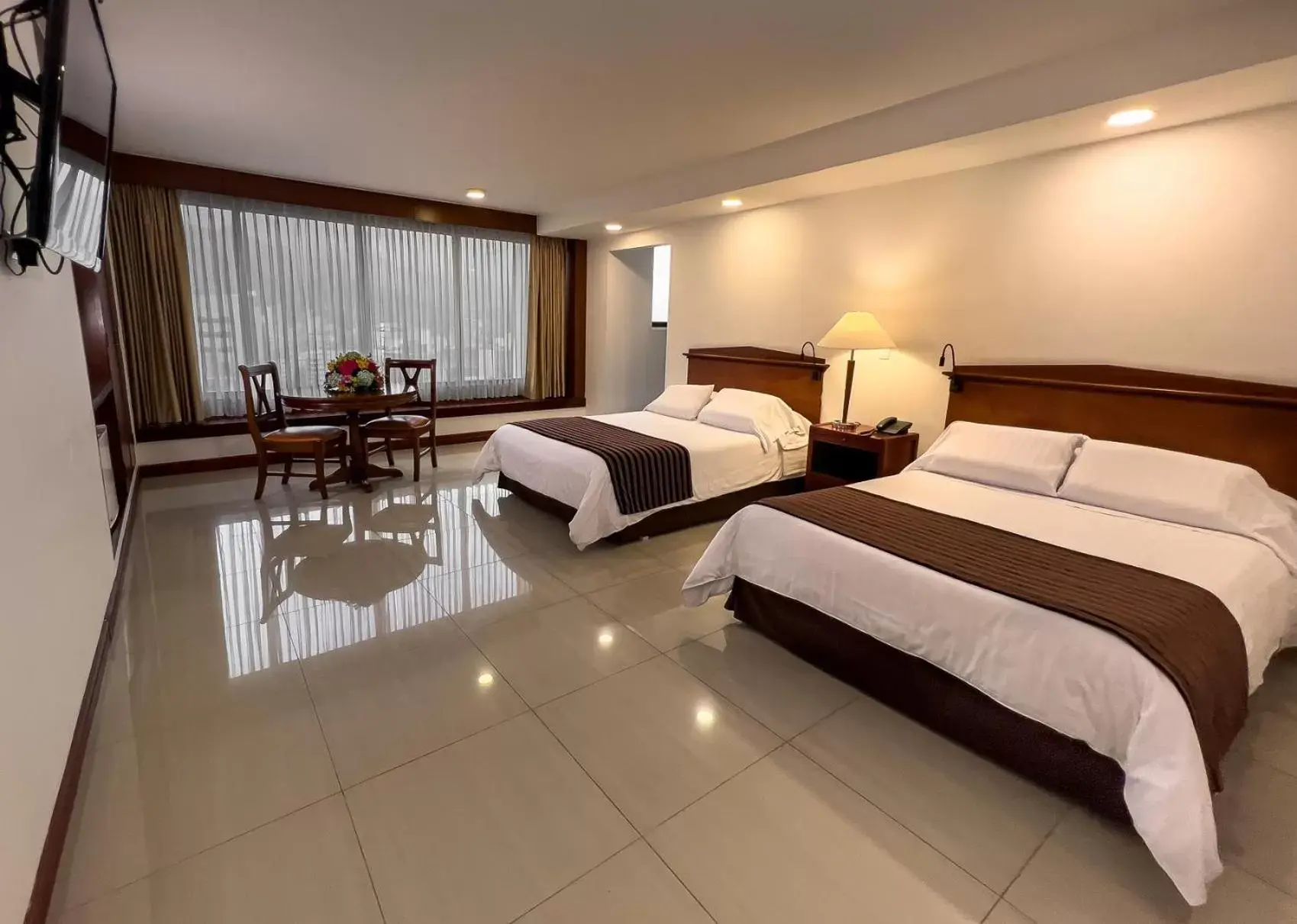 Bed in Torre de Cali Plaza Hotel