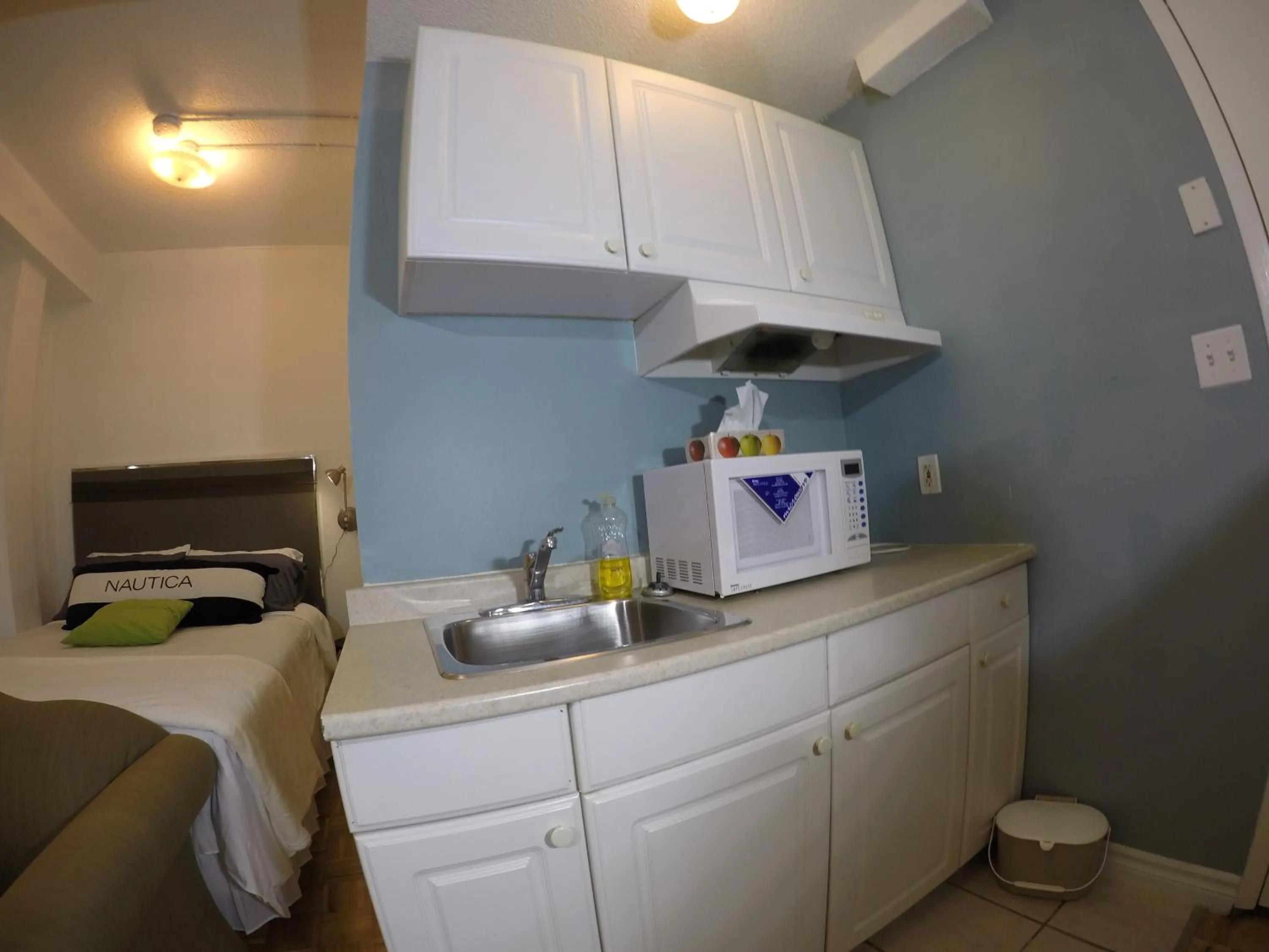 Kitchen or kitchenette, Bed in Saint Lawrence Residences and Suites