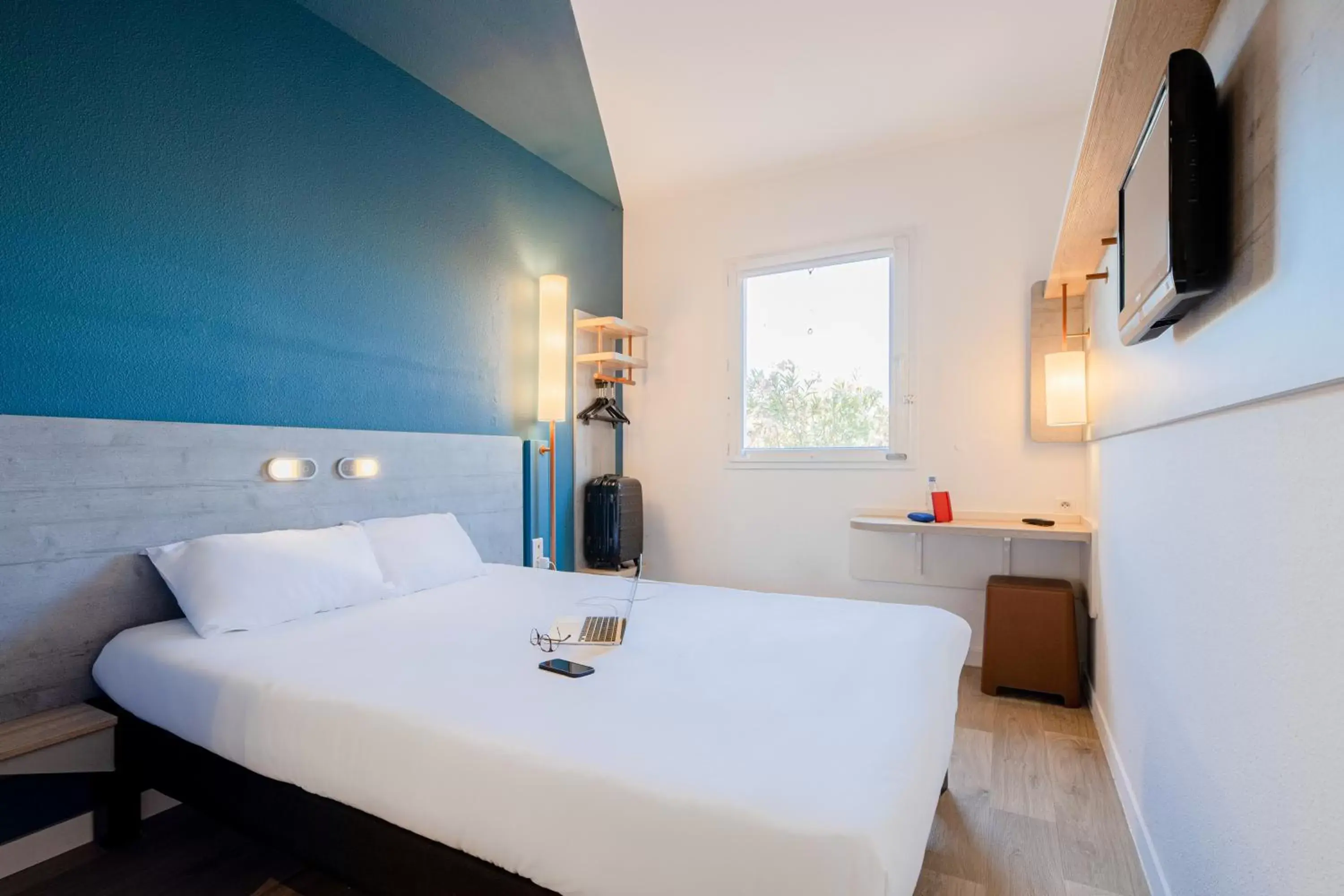 Bedroom in Ibis Budget Perpignan Nord Rivesaltes