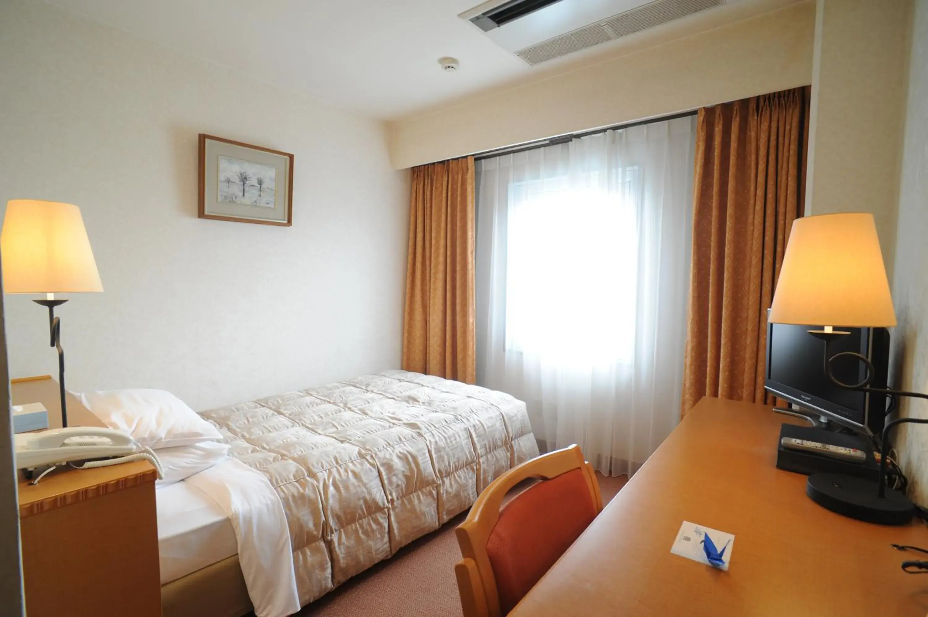 Photo of the whole room, Bed in Kagoshima Sun Royal Hotel