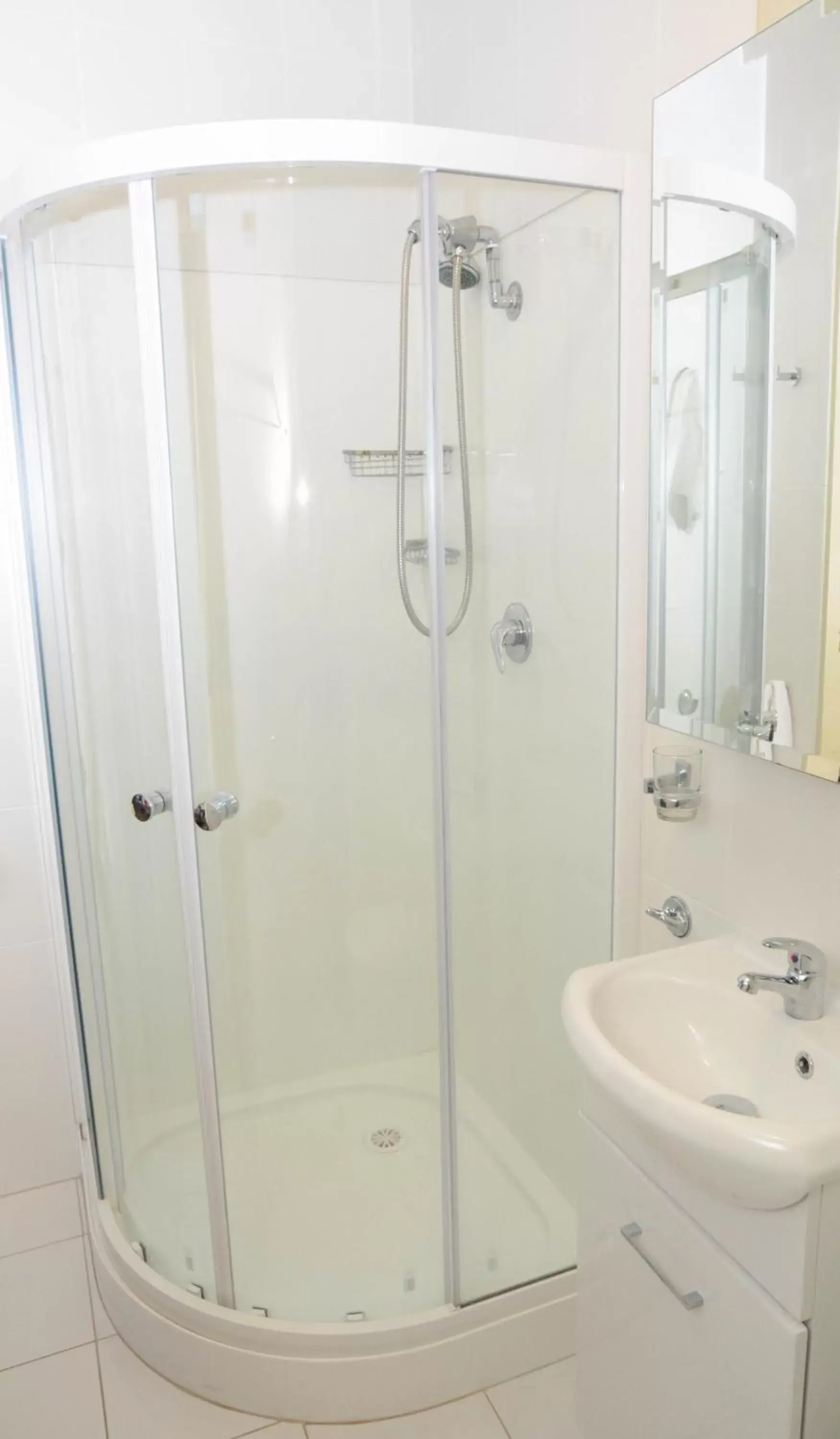 Shower, Bathroom in Westside Studio Apartments