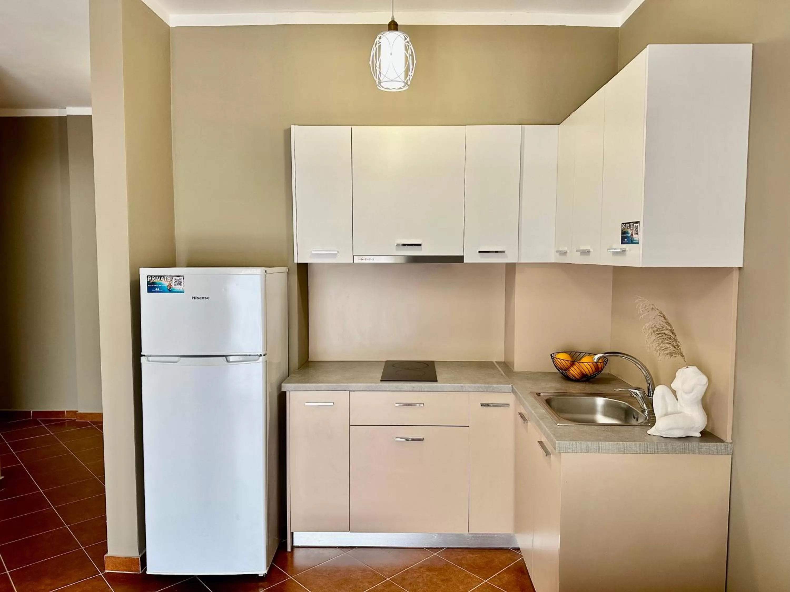 Kitchen or kitchenette in FAMILY SUITE RESIDENCE