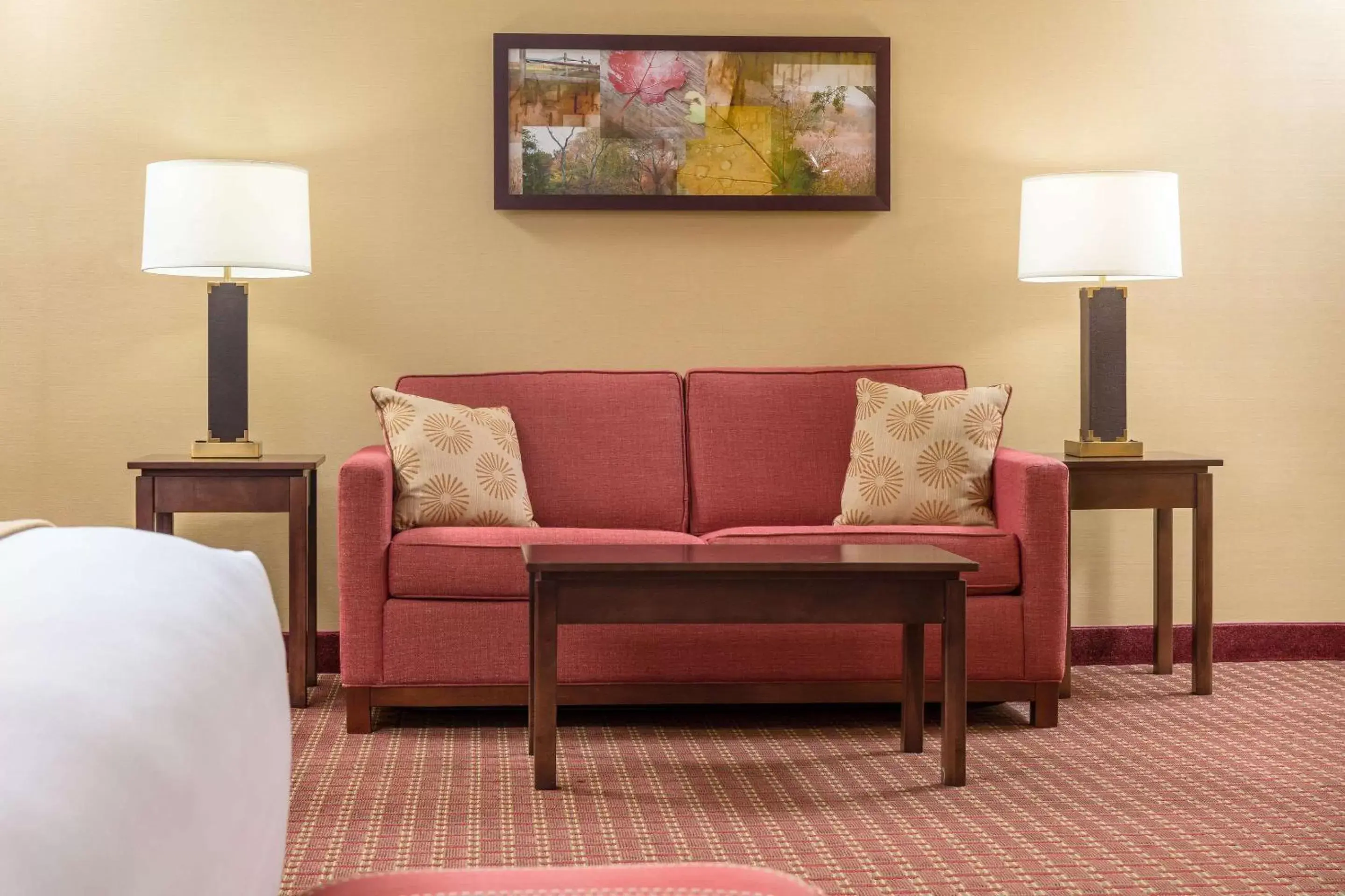 Photo of the whole room, Seating Area in Comfort Inn & Suites Near Burke Mountain