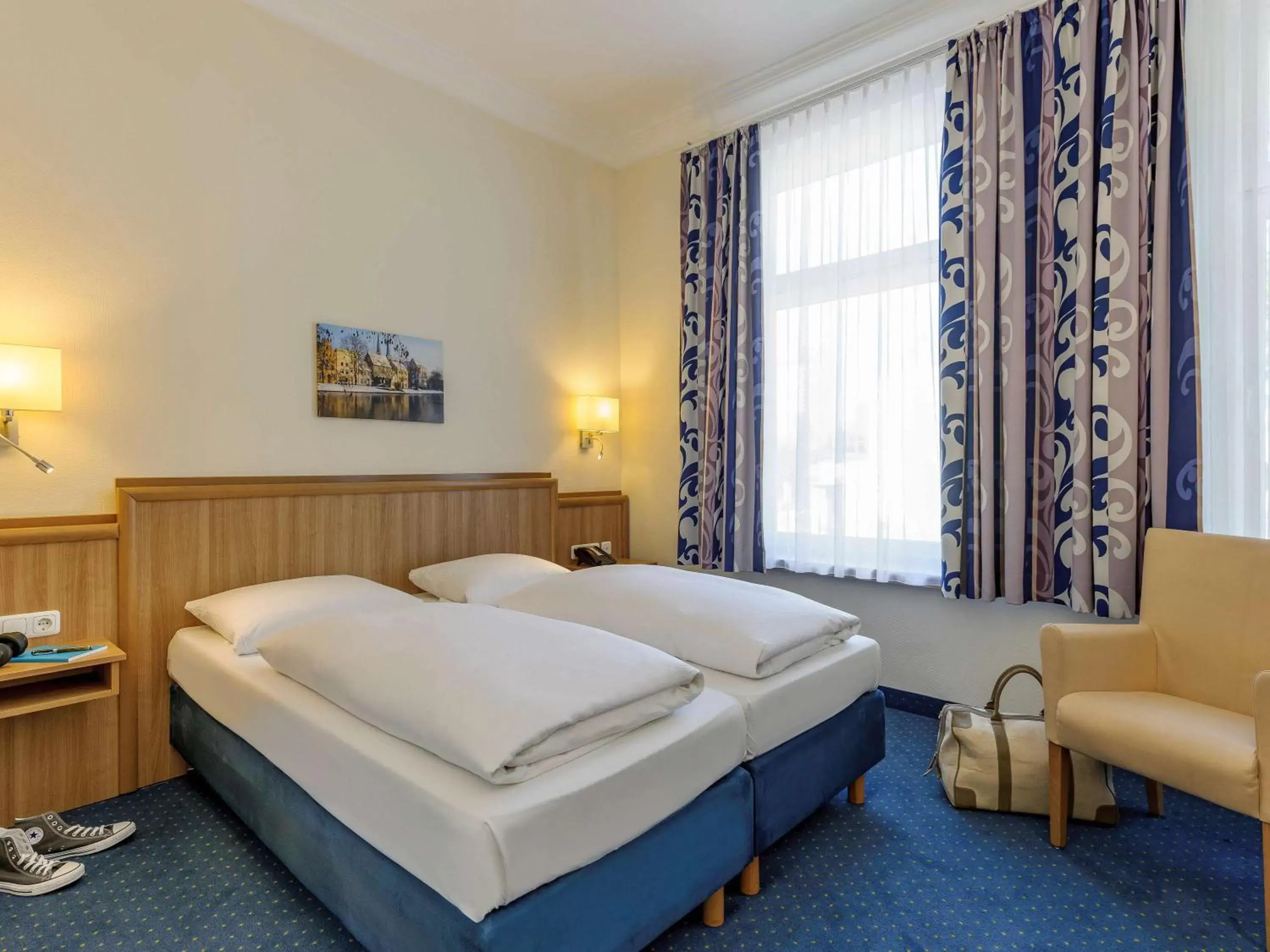 Photo of the whole room, Bed in Mercure Hotel Luebeck City Center