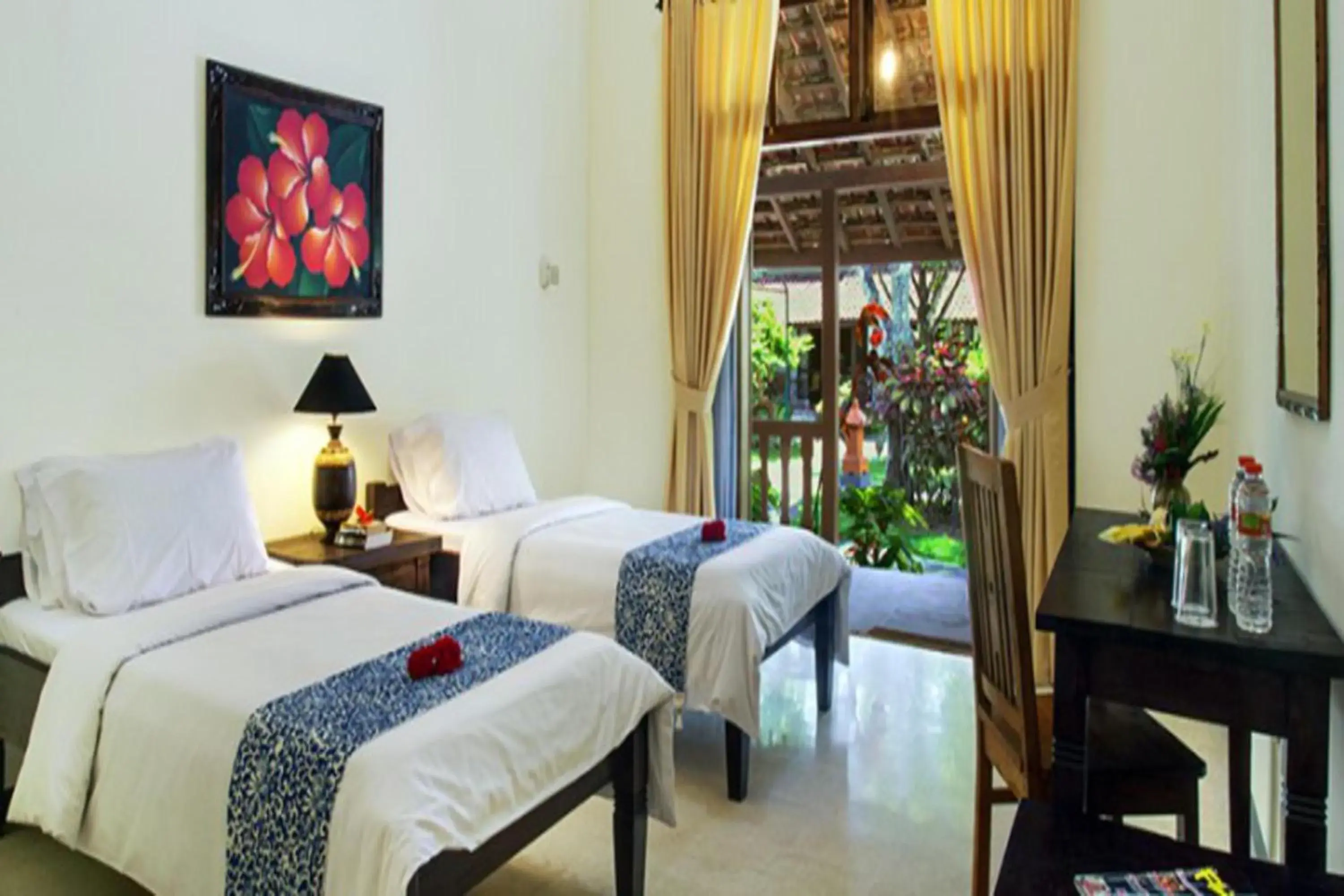 Bed in Margo Utomo Eco Resort by Tripletree