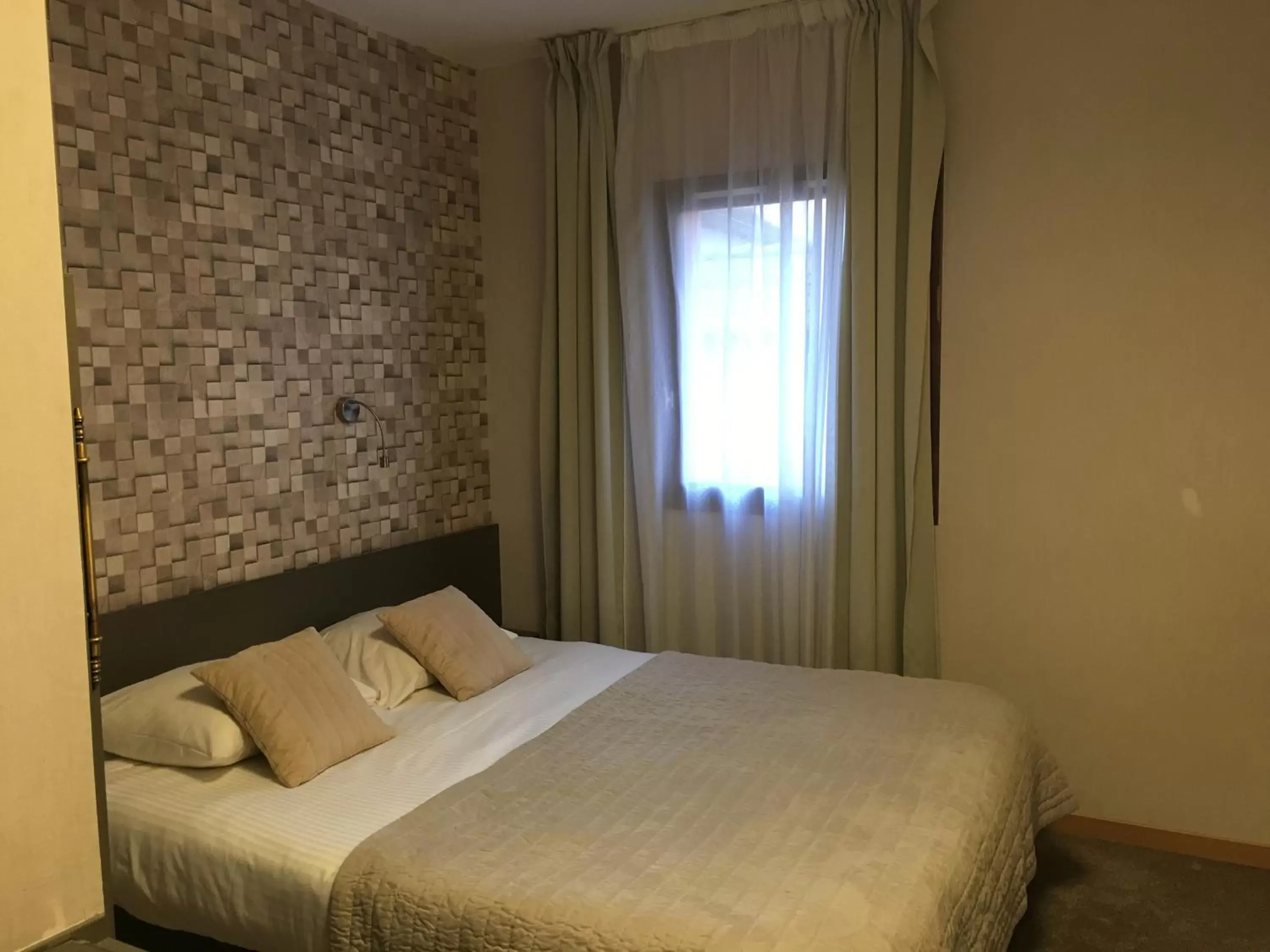 Photo of the whole room, Bed in Hôtel Le Rapp