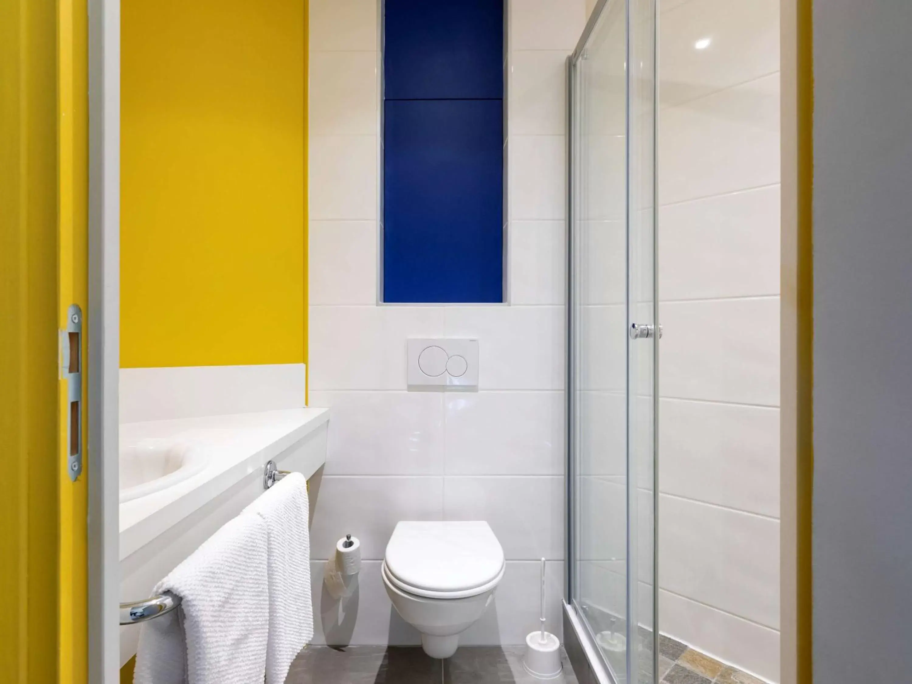 Bathroom in Ibis Budget Lyon Est Saint Quentin Fallavier