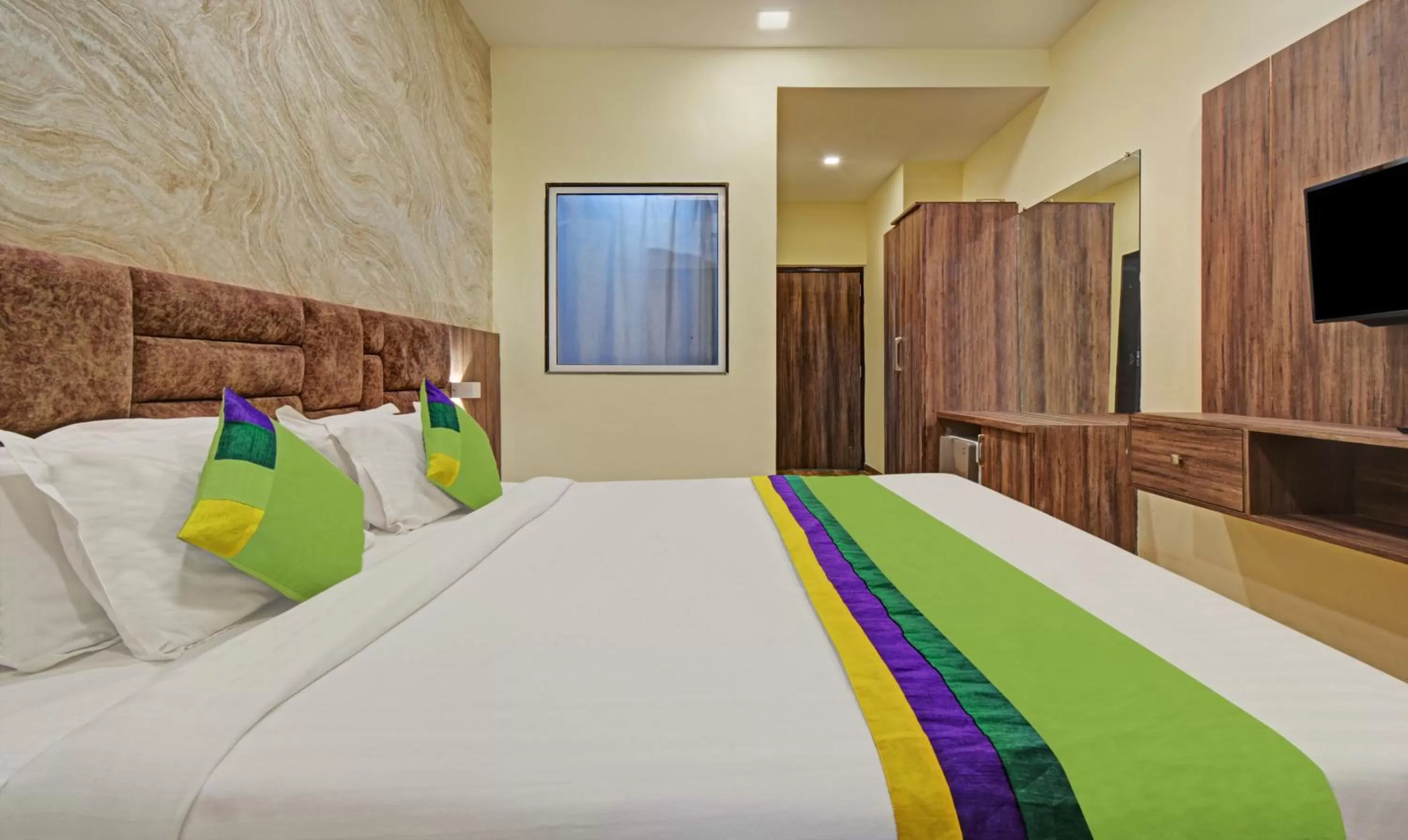 Bed in Tripli Hotels Le Shelton