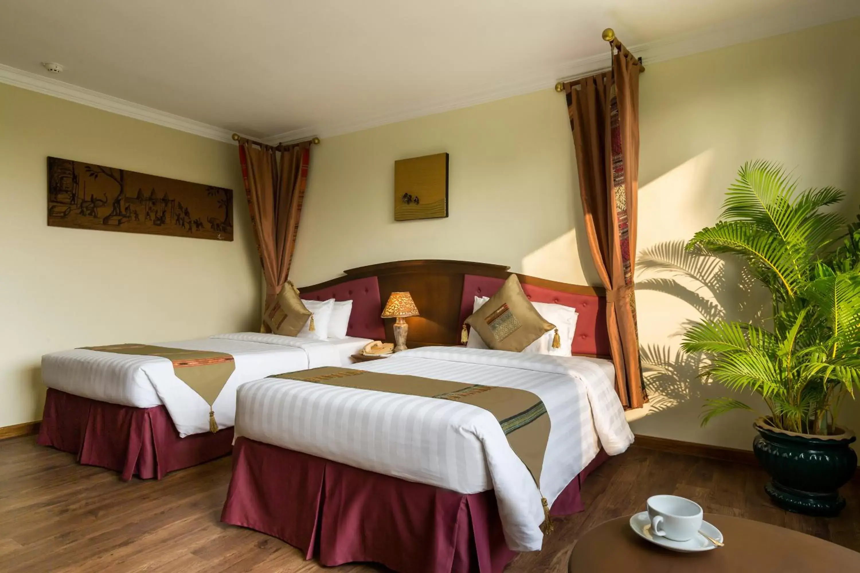 Bed in Angkor Century Resort & Spa