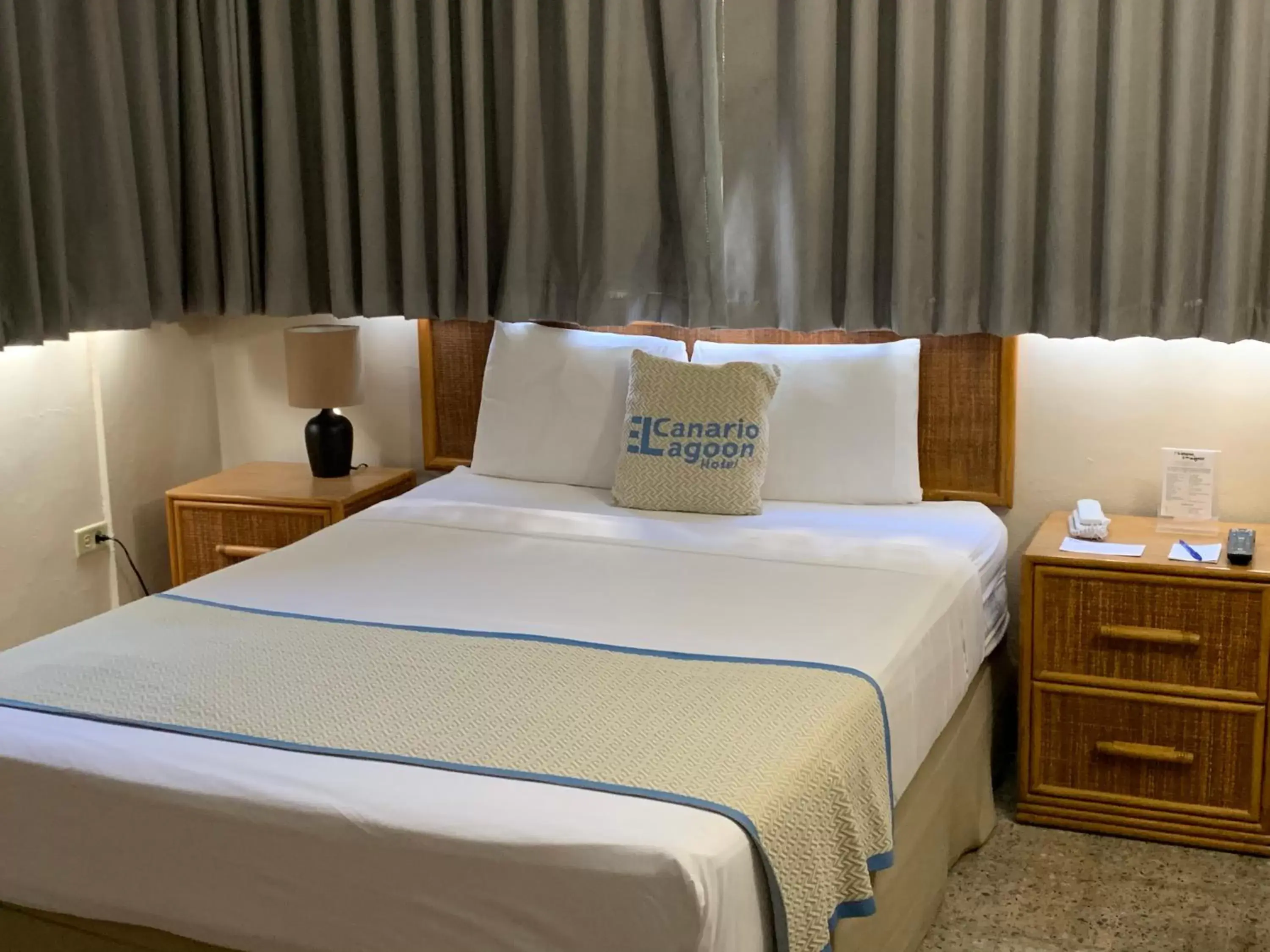 Bed in Canario Lagoon Hotel