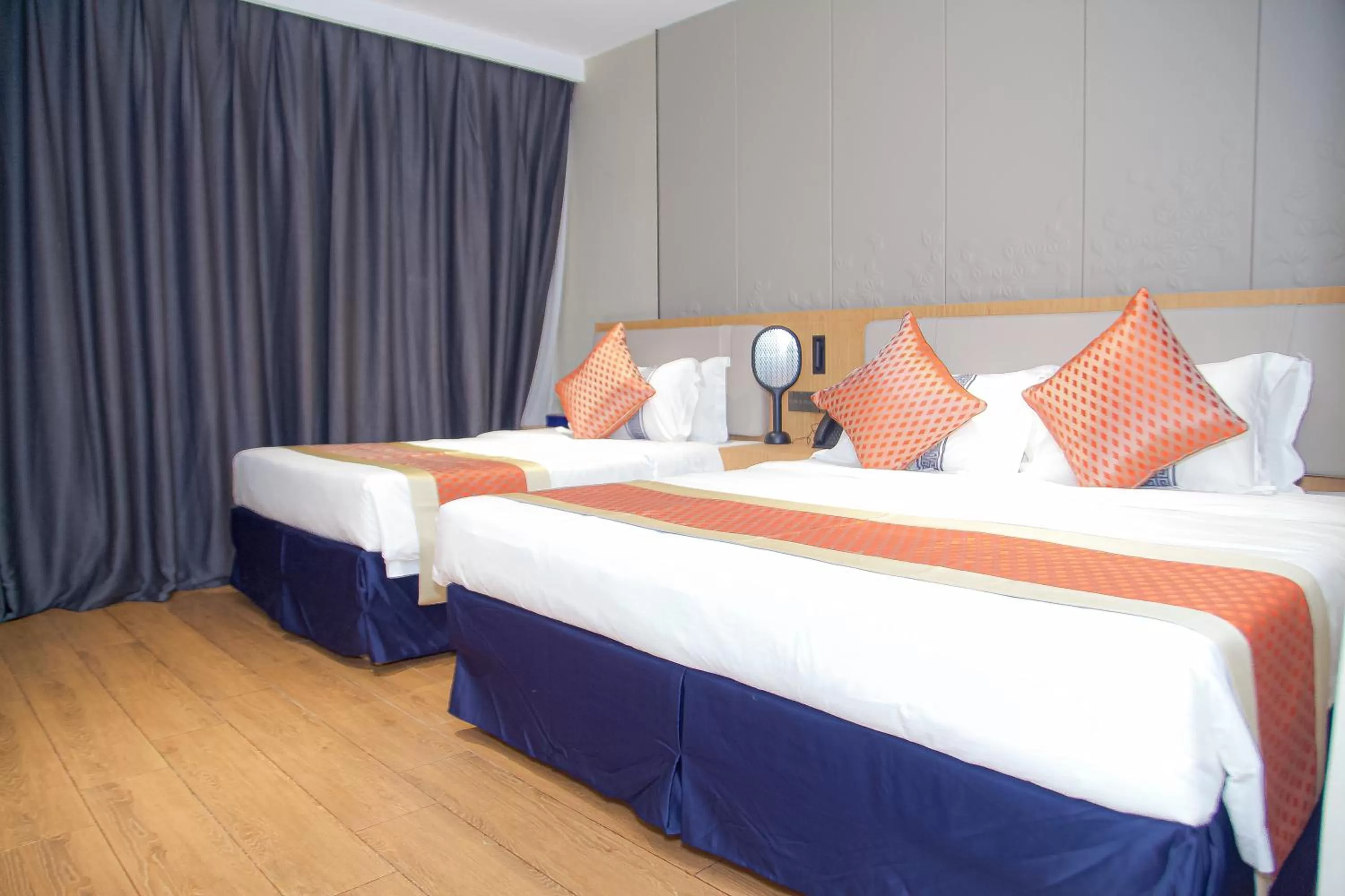 Photo of the whole room in Hôtel FAMILLE MONDIALE