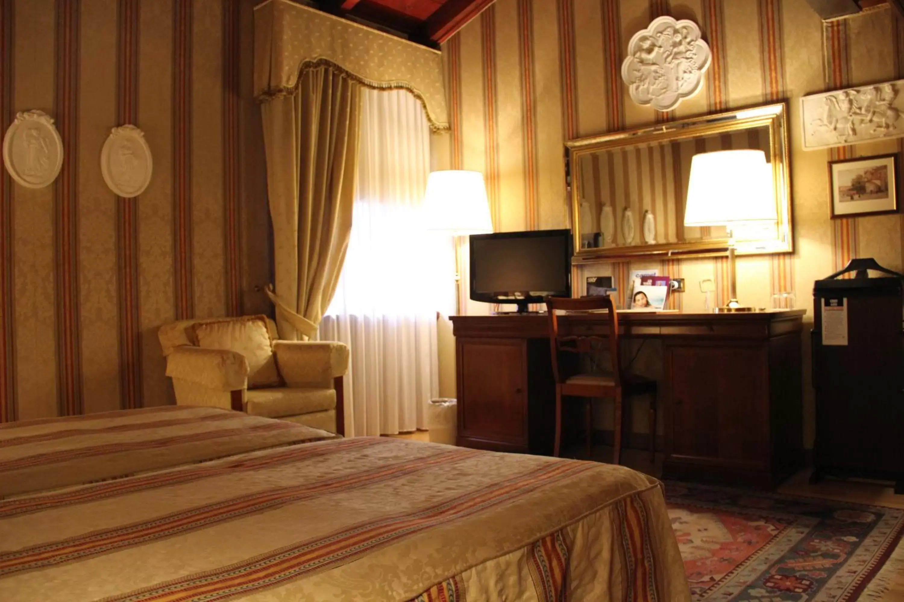 Photo of the whole room, TV/Entertainment Center in Villa Quaranta Tommasi Wine Hotel & SPA