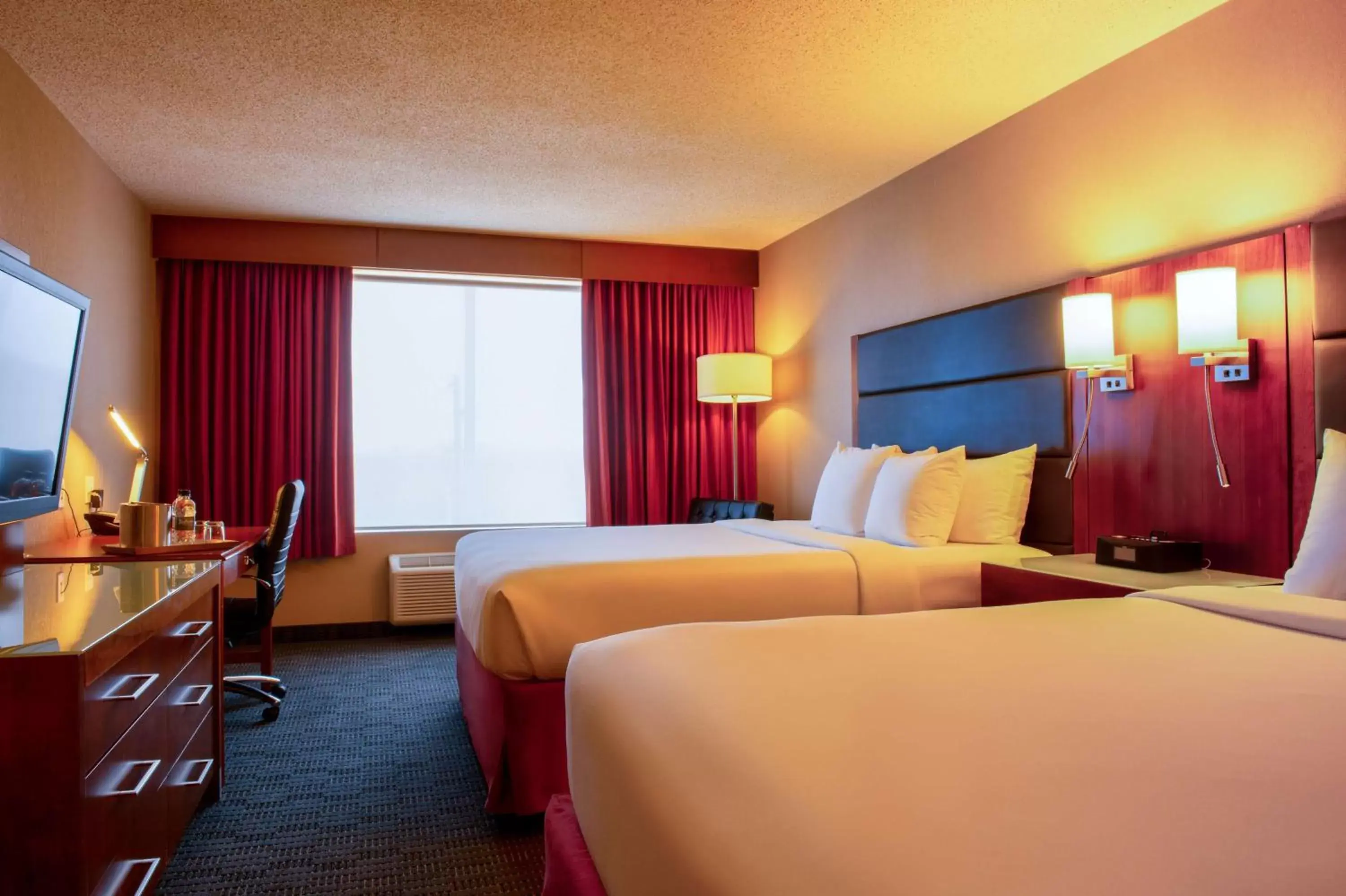 Photo of the whole room, Bed in Radisson Hotel & Suites Fort McMurray