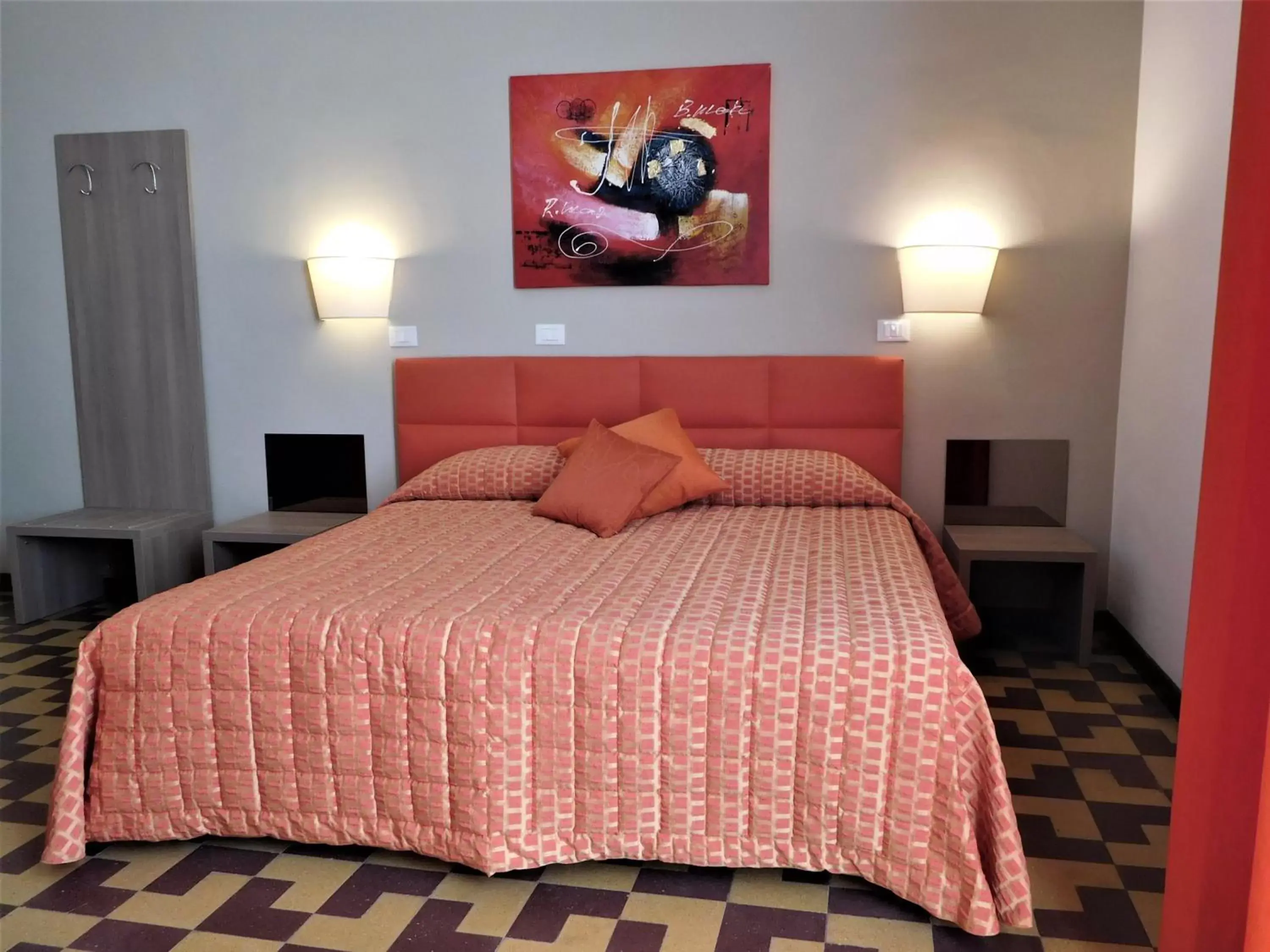 Bed in Moonlight Hotel&Suites