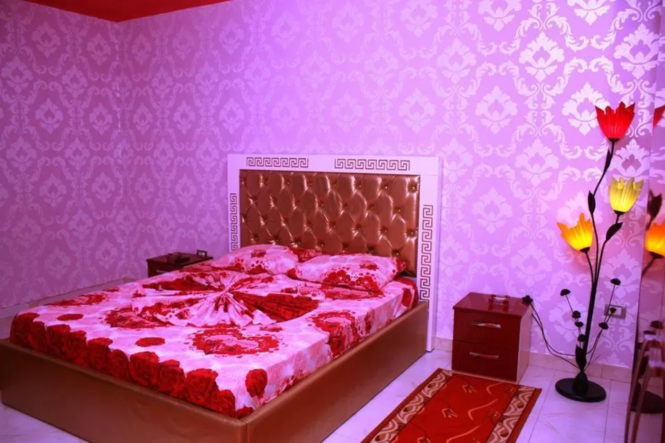 Bed in Hotel Buza