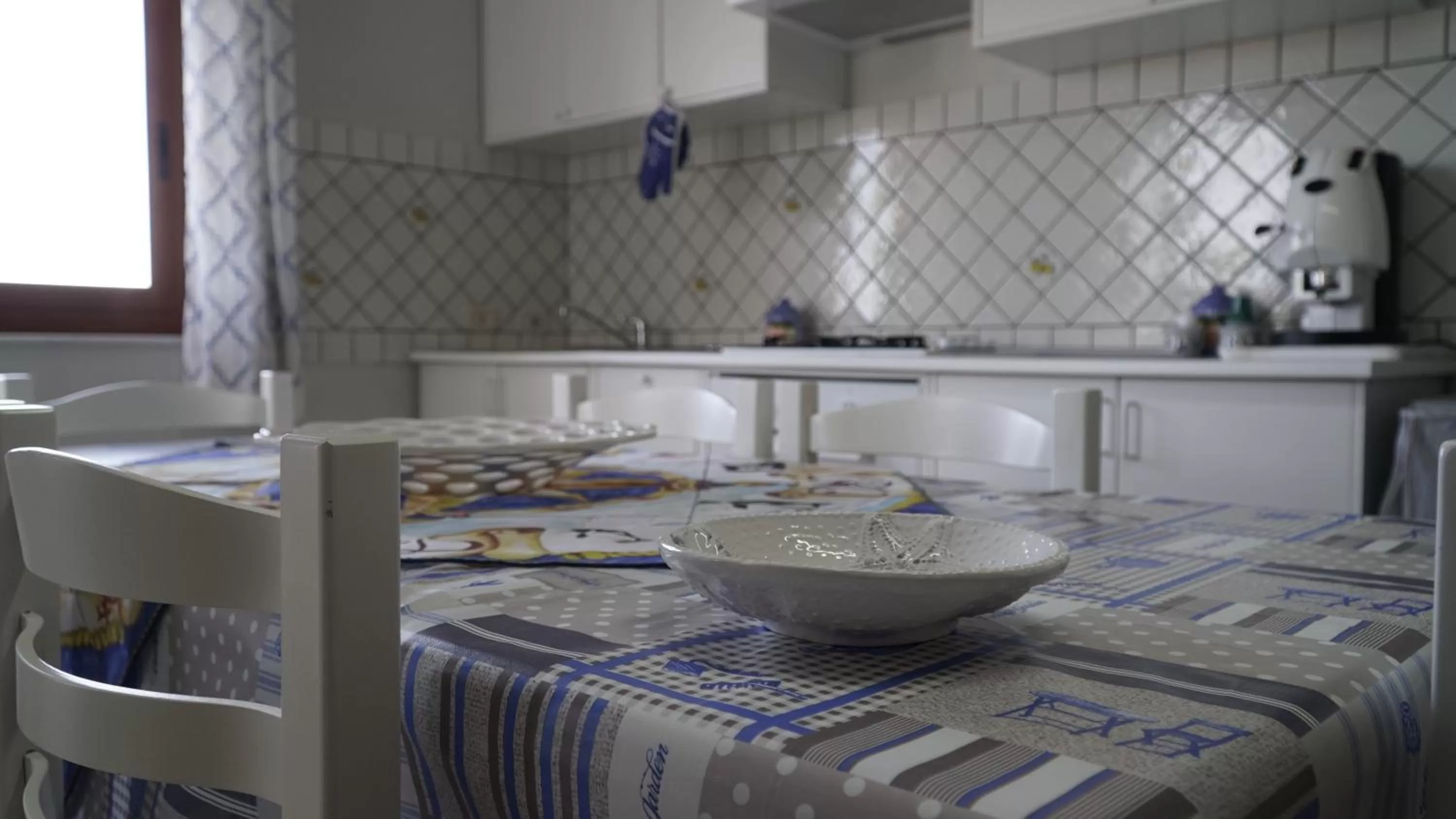 Kitchen or kitchenette, Bed in Deep Sea Residence