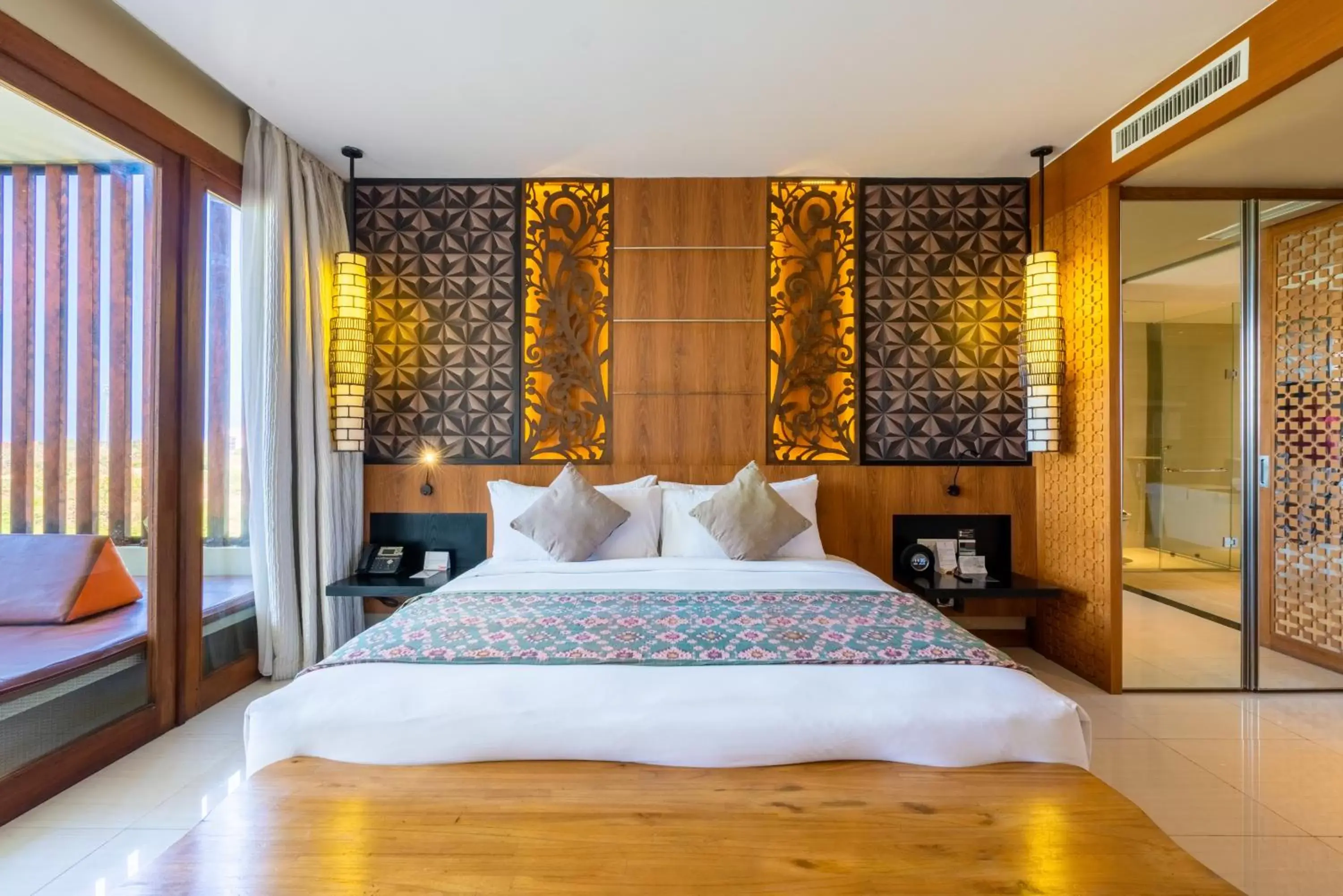 Bed in Vouk Hotel and Suites