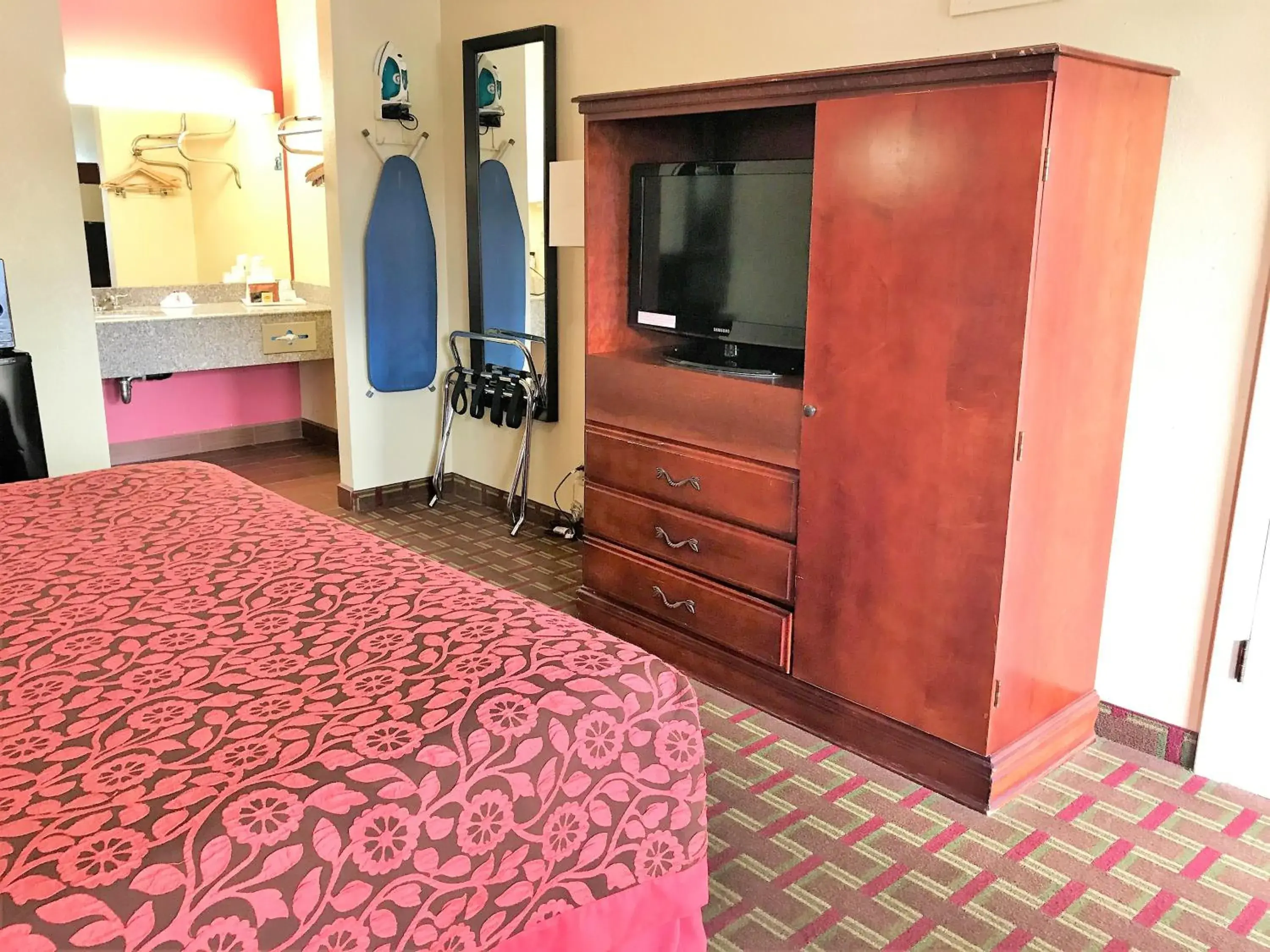 Photo of the whole room, TV/Entertainment Center in Days Inn by Wyndham East Albuquerque