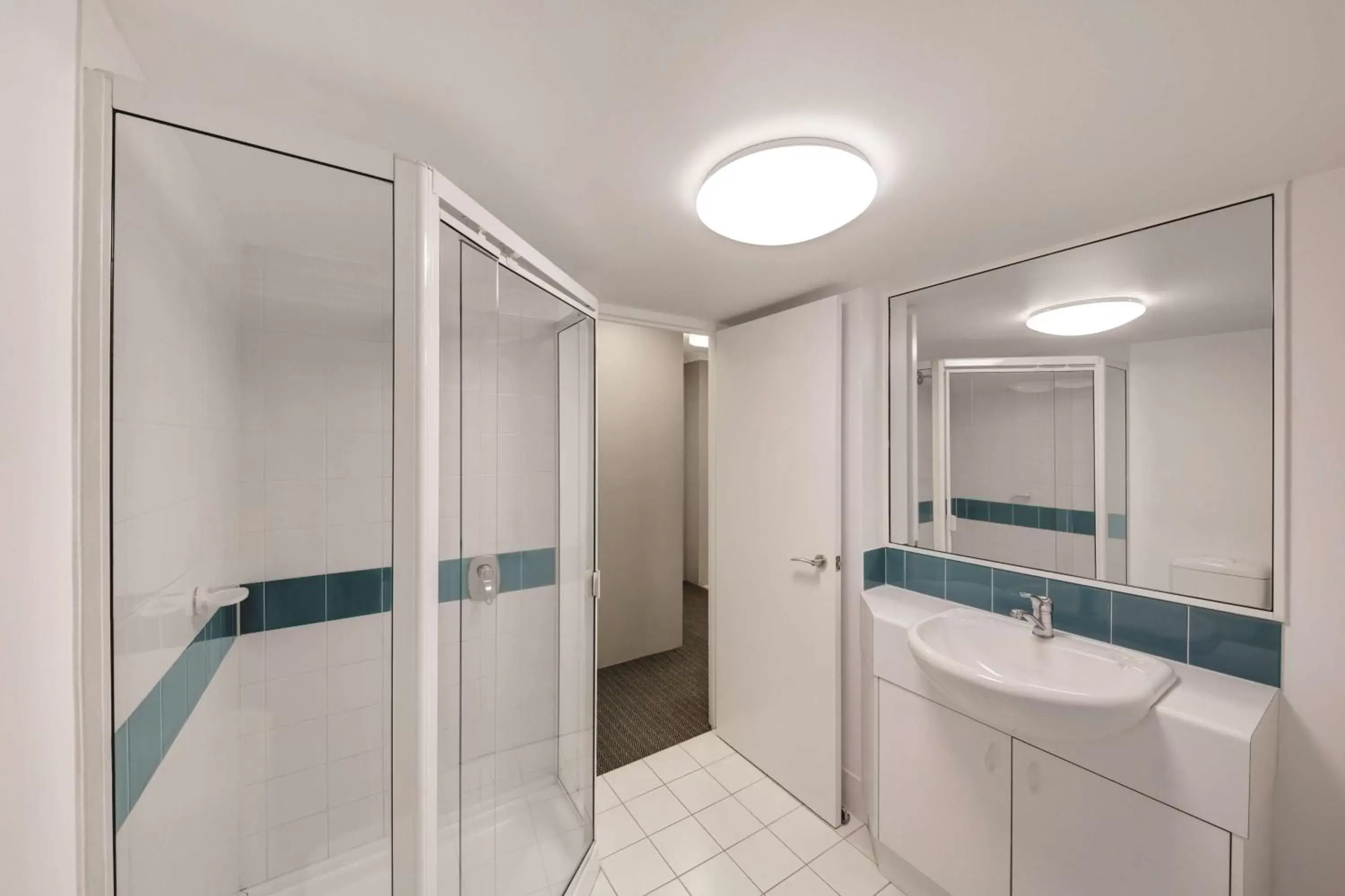 Bathroom in Adina Serviced Apartments Canberra James Court