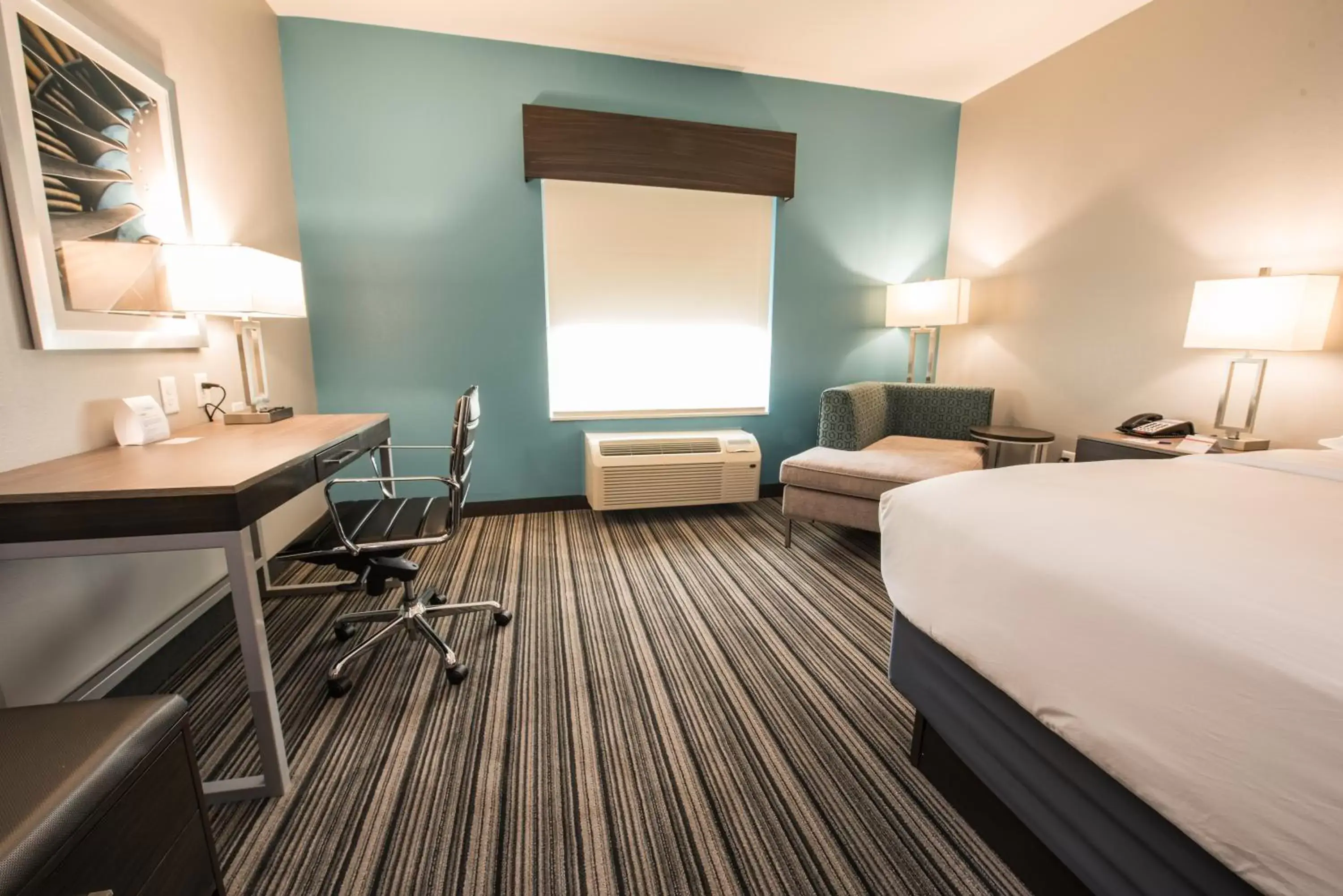 Bedroom in Holiday Inn Express & Suites Houston - Hobby Airport Area, an IHG Hotel