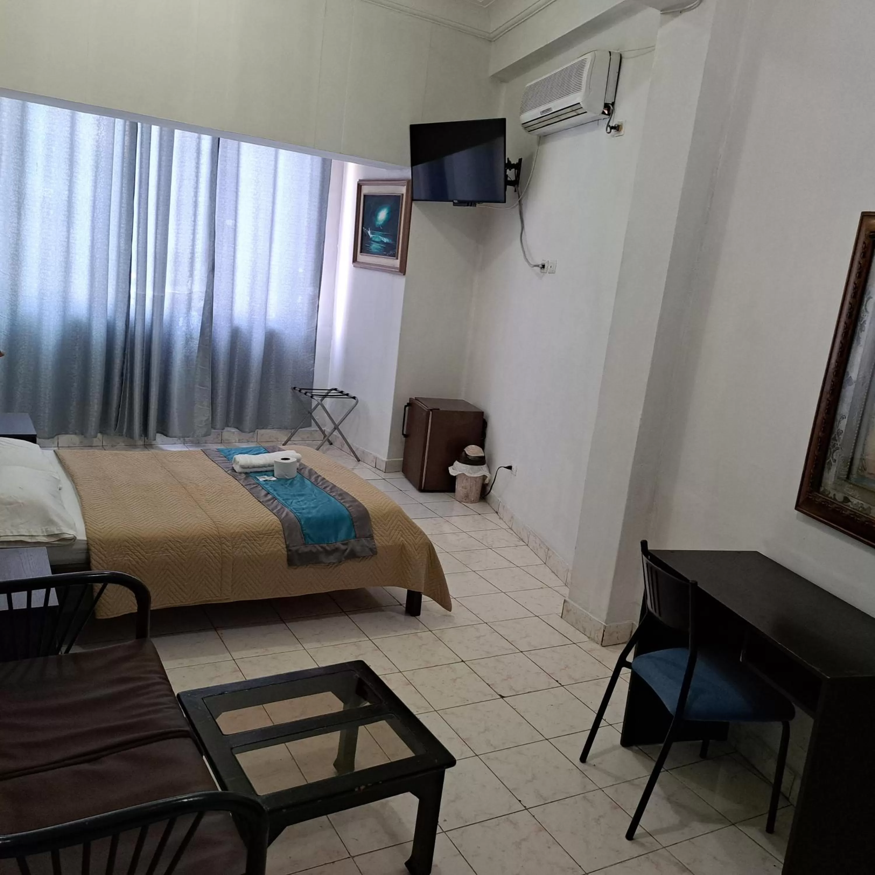 Photo of the whole room, Bed in Atlantic Suites Hotel