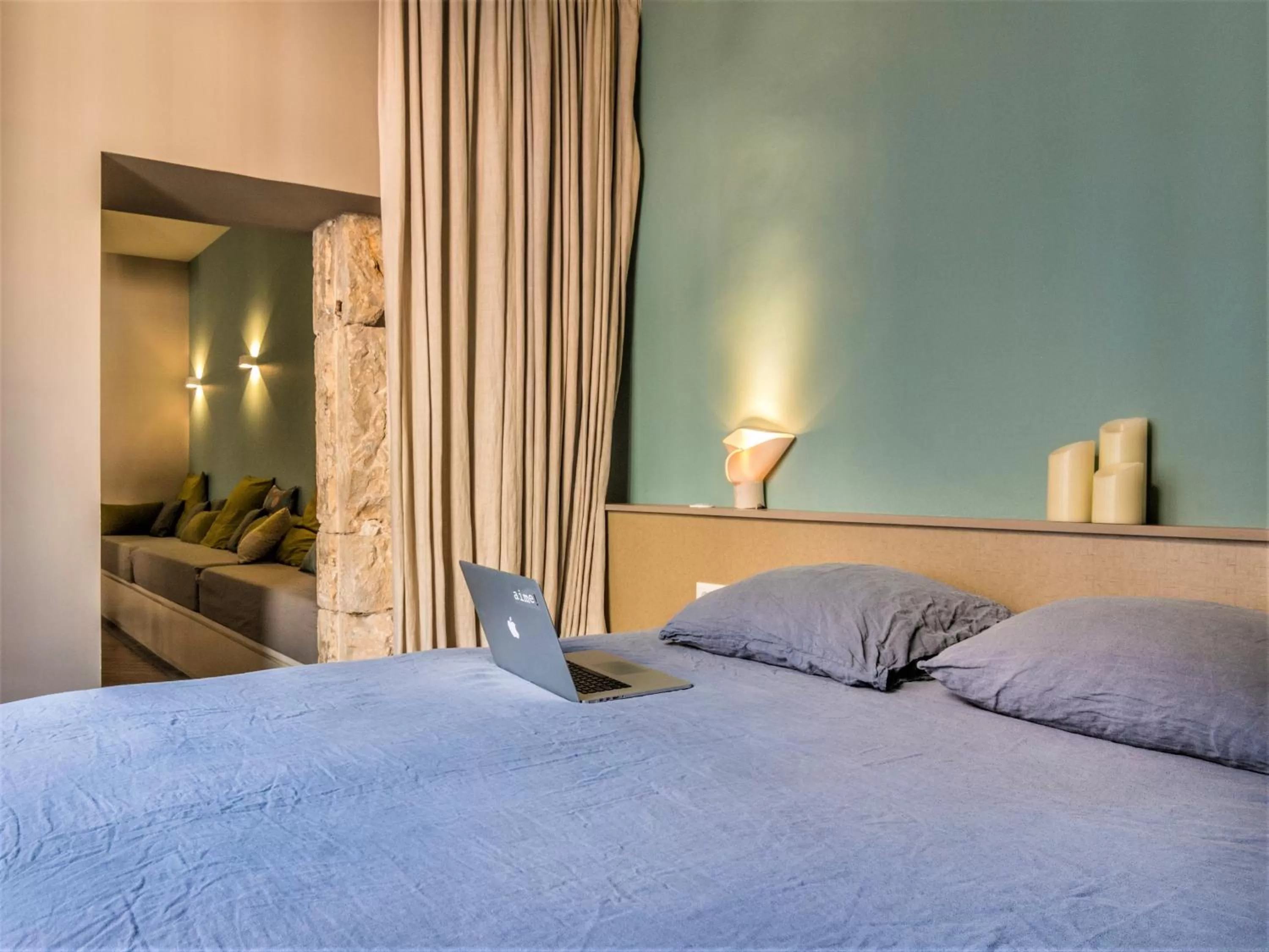 Bed in MiHotel Bellecour