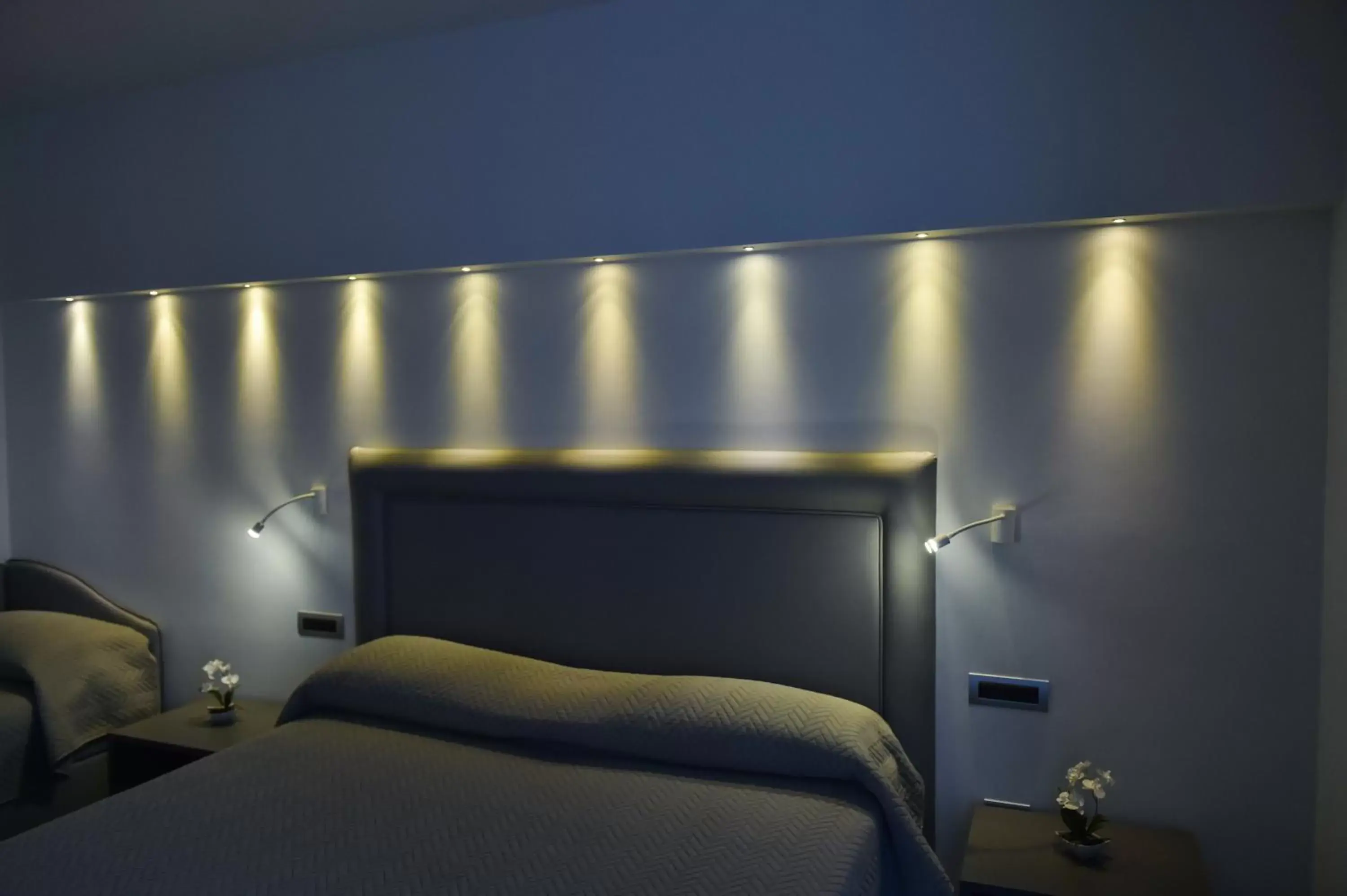 Bed in Pompei Inn Ruins B&B Luxury Suite