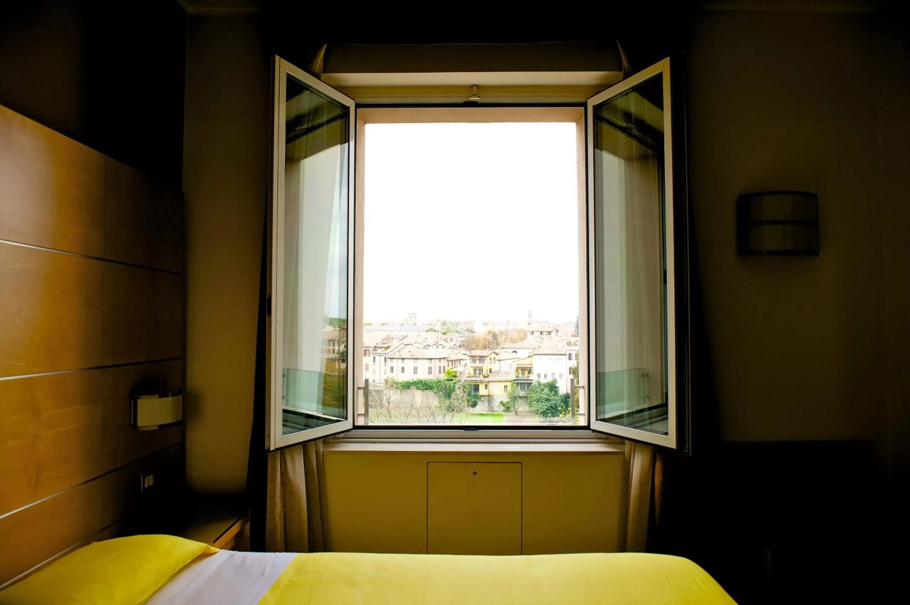 River view, Bed in Ibis Styles Parma Toscanini River view, Bed in Ibis Styles Parma Toscanini