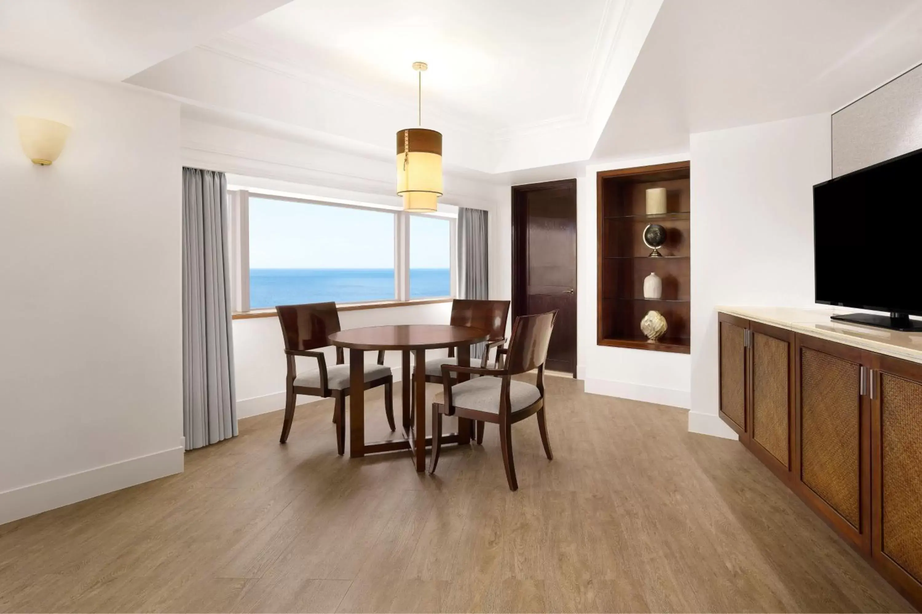 Photo of the whole room, Dining Area in The Westin Resort Guam