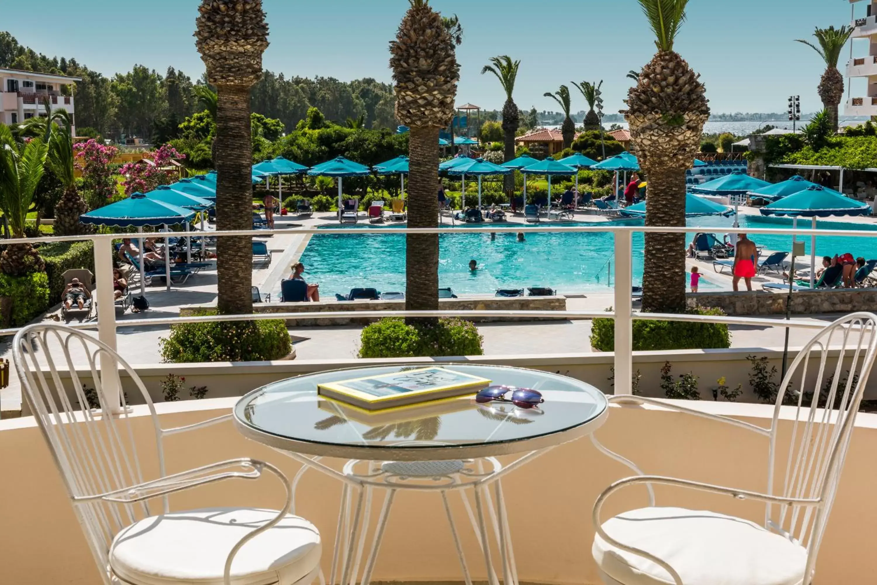 Balcony/Terrace, Pool View in Mitsis Ramira Beach Hotel