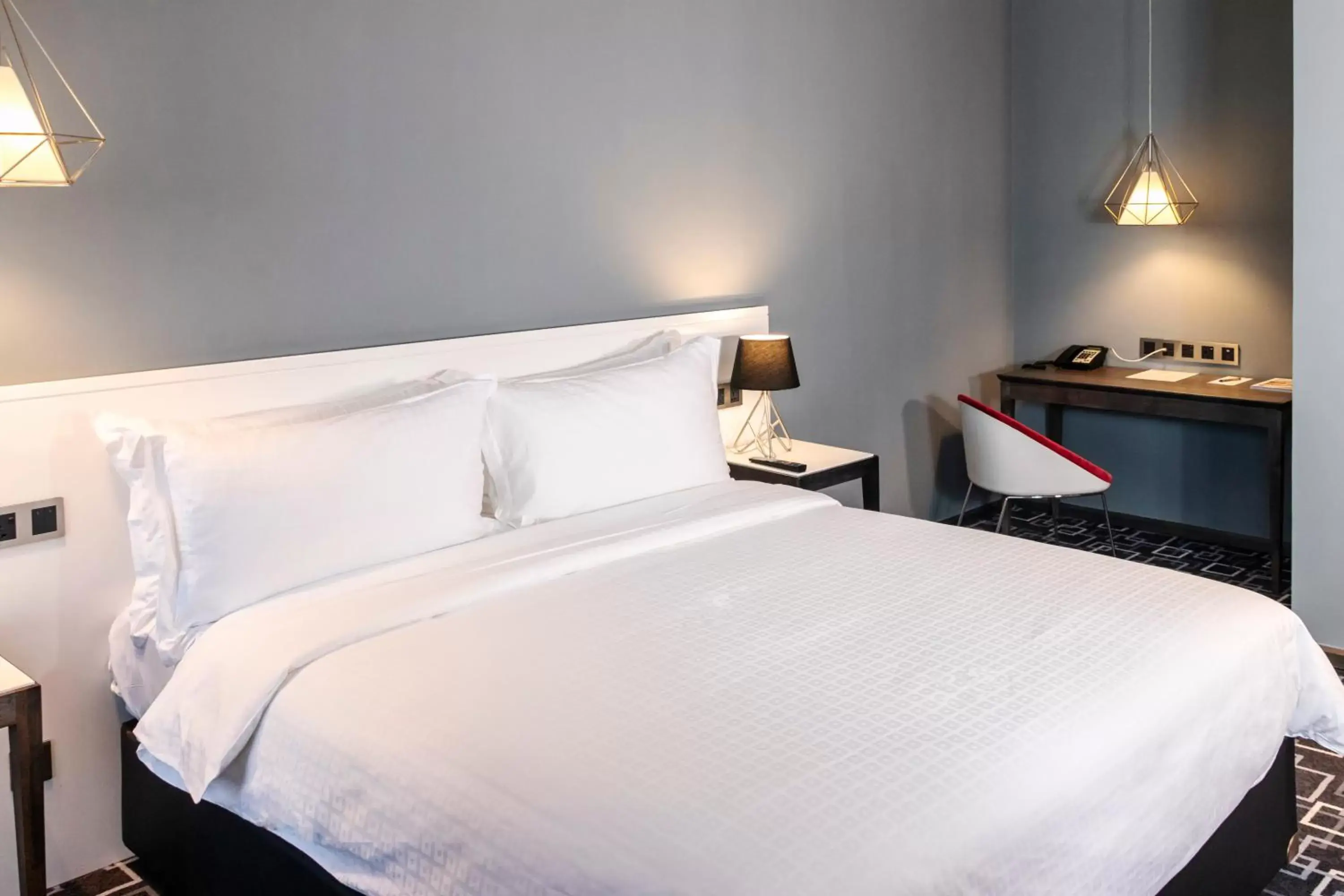 Bed in Trademark Hotel, a Member of Design Hotels