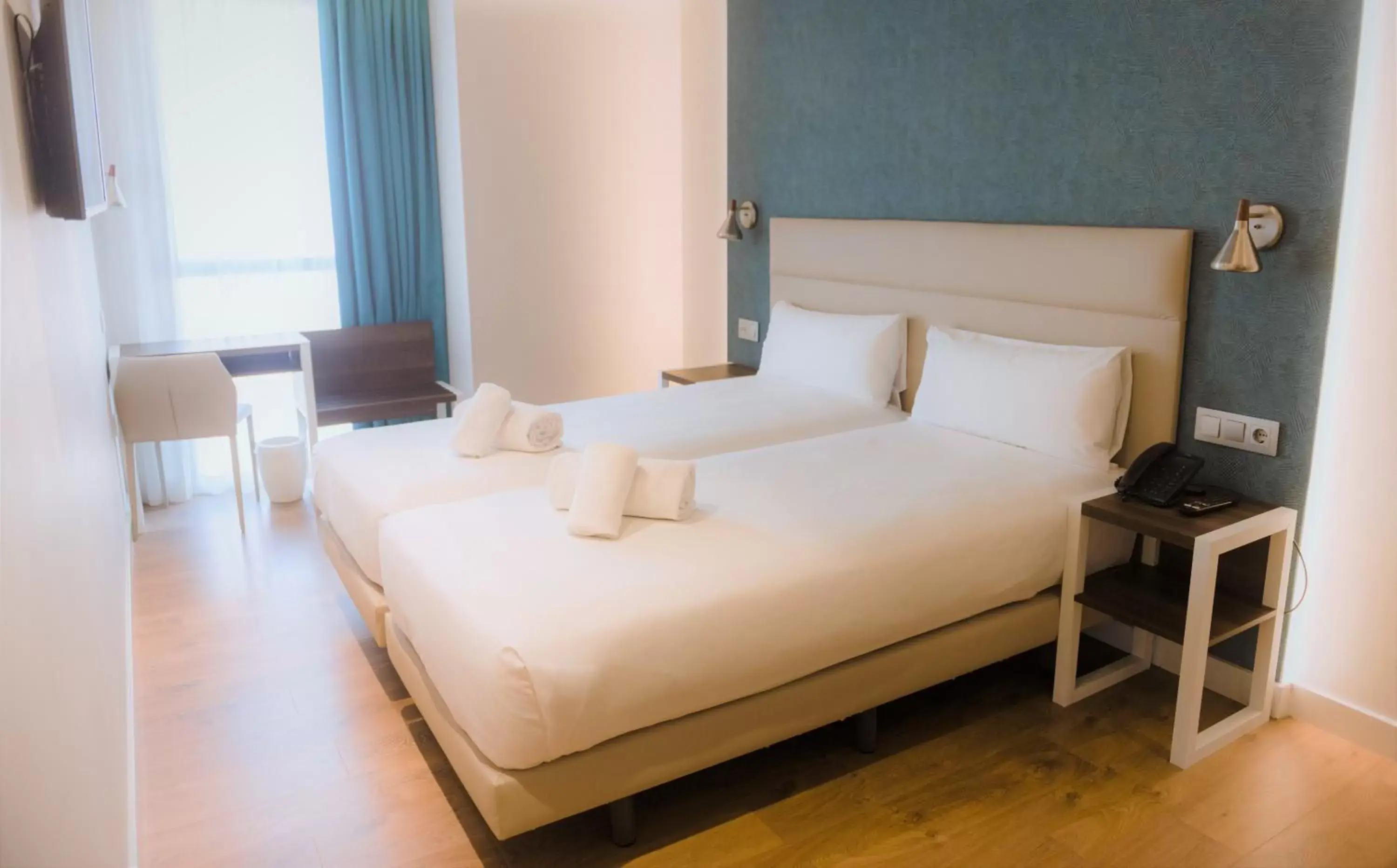 Bed in Arya Stadium Hotel