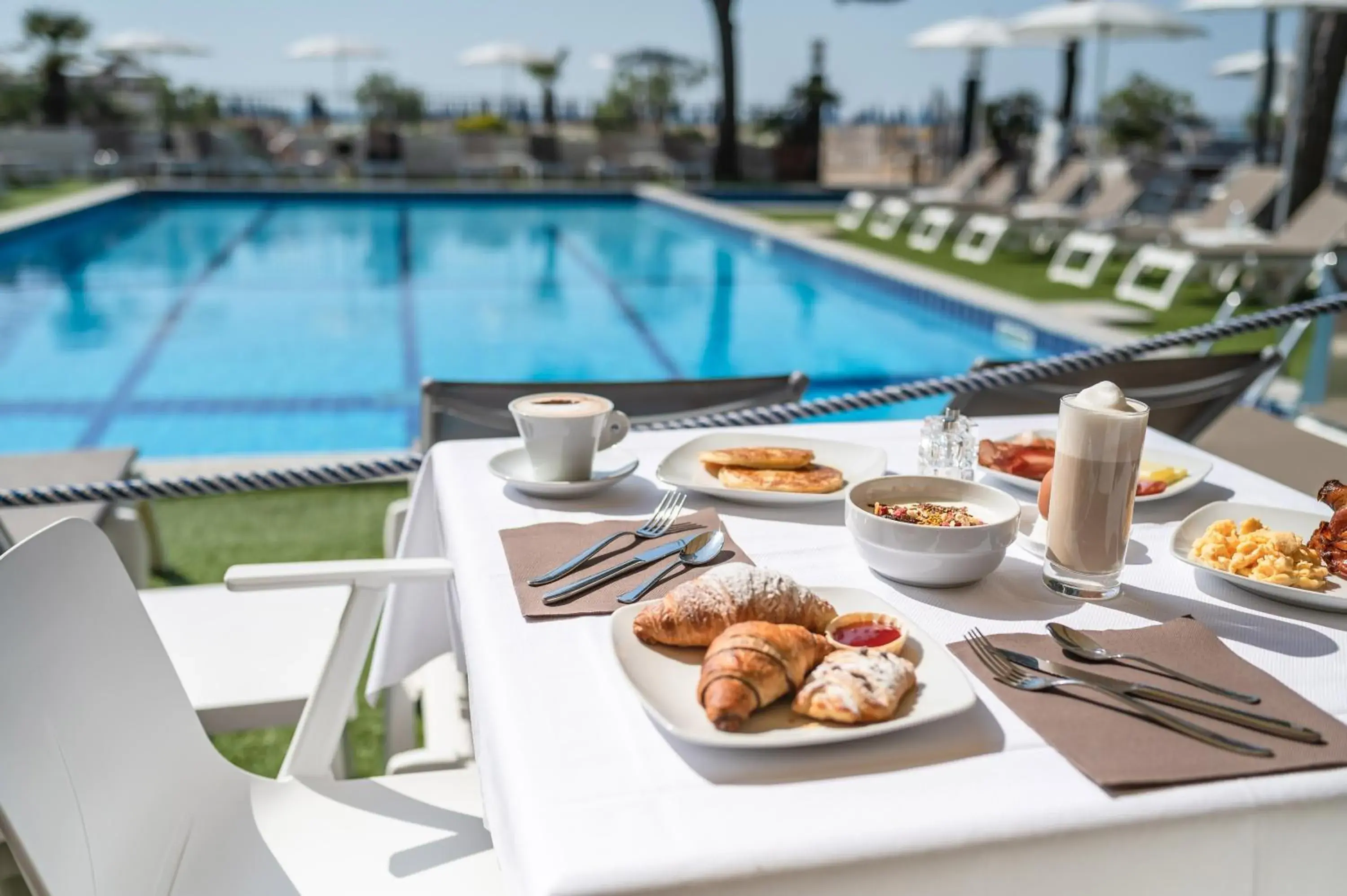 Breakfast, Swimming Pool in Hotel Excelsior