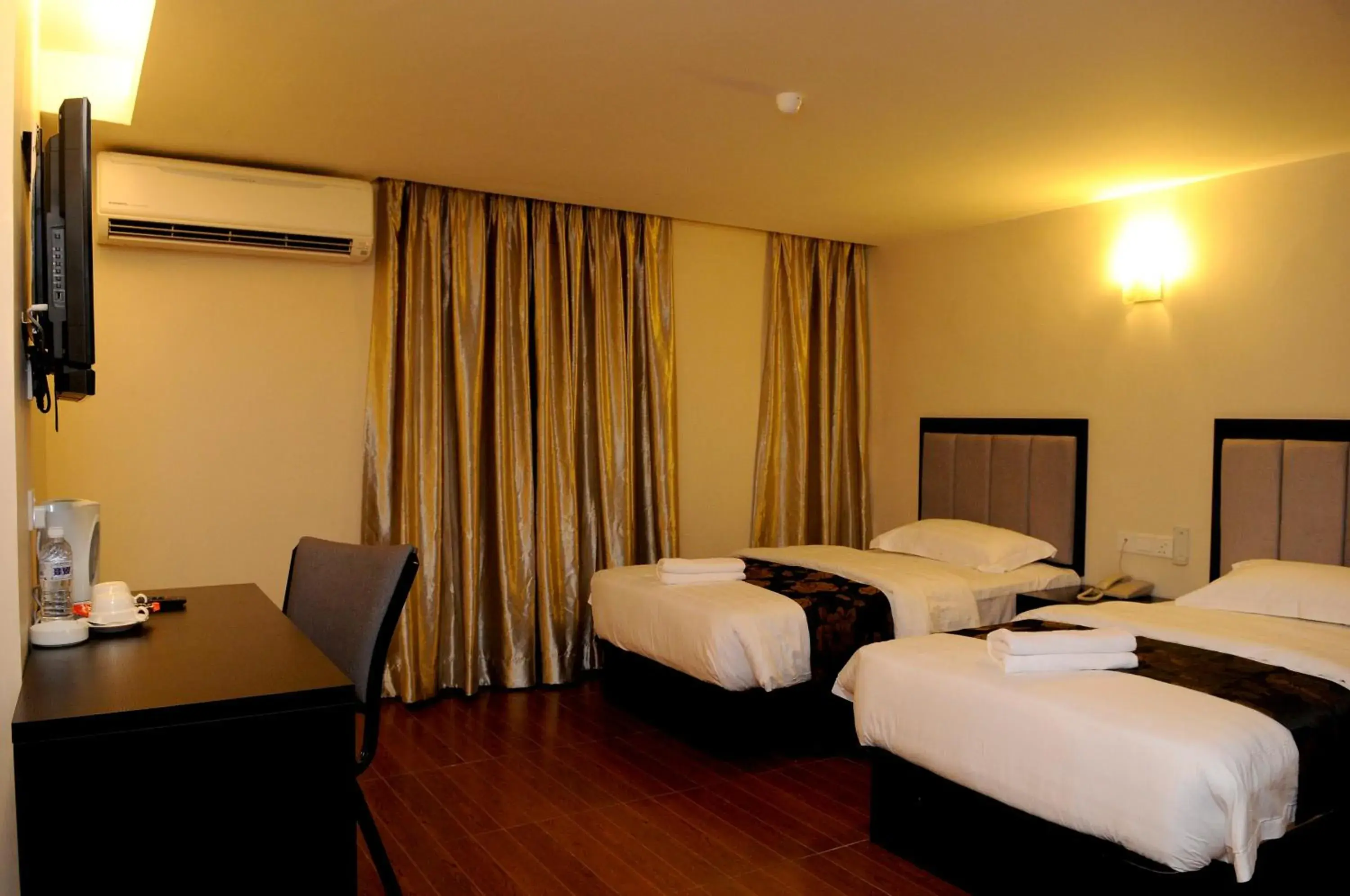 Photo of the whole room, Bed in Kk Waterfront Hotel