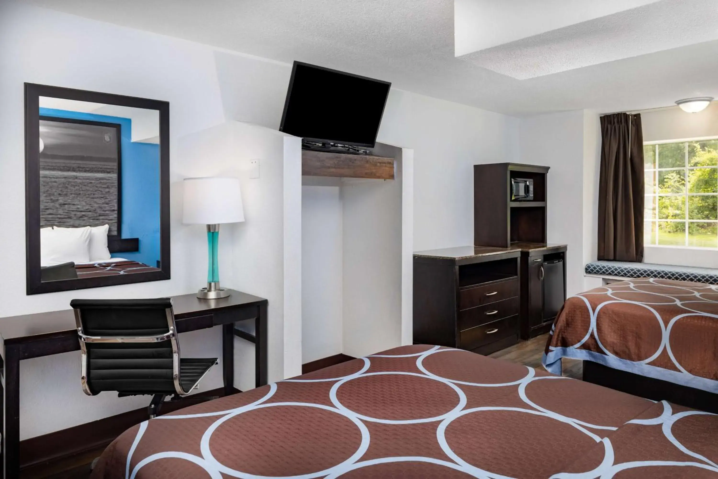 Bed, TV/Entertainment Center in Super 8 by Wyndham Pensacola