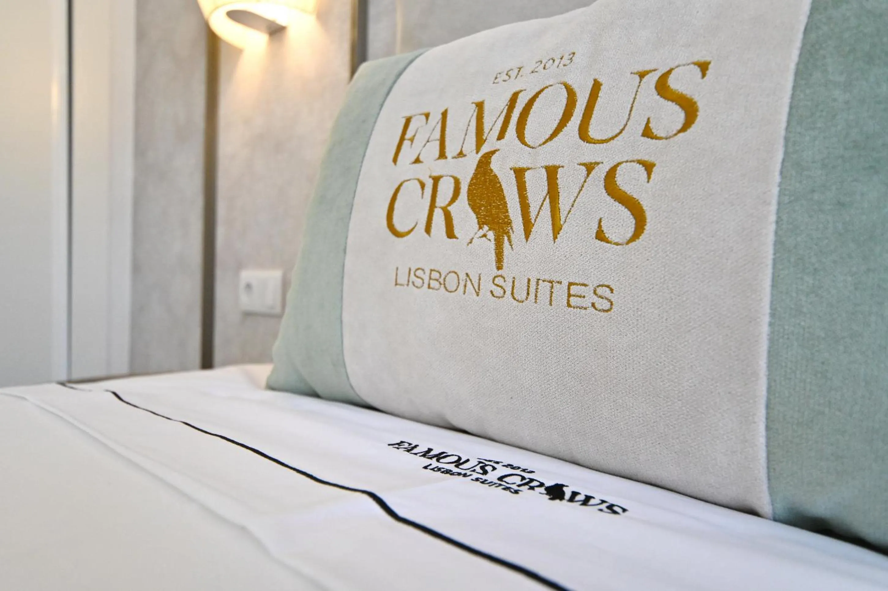 Bed in Famous Crows Lisbon Suites