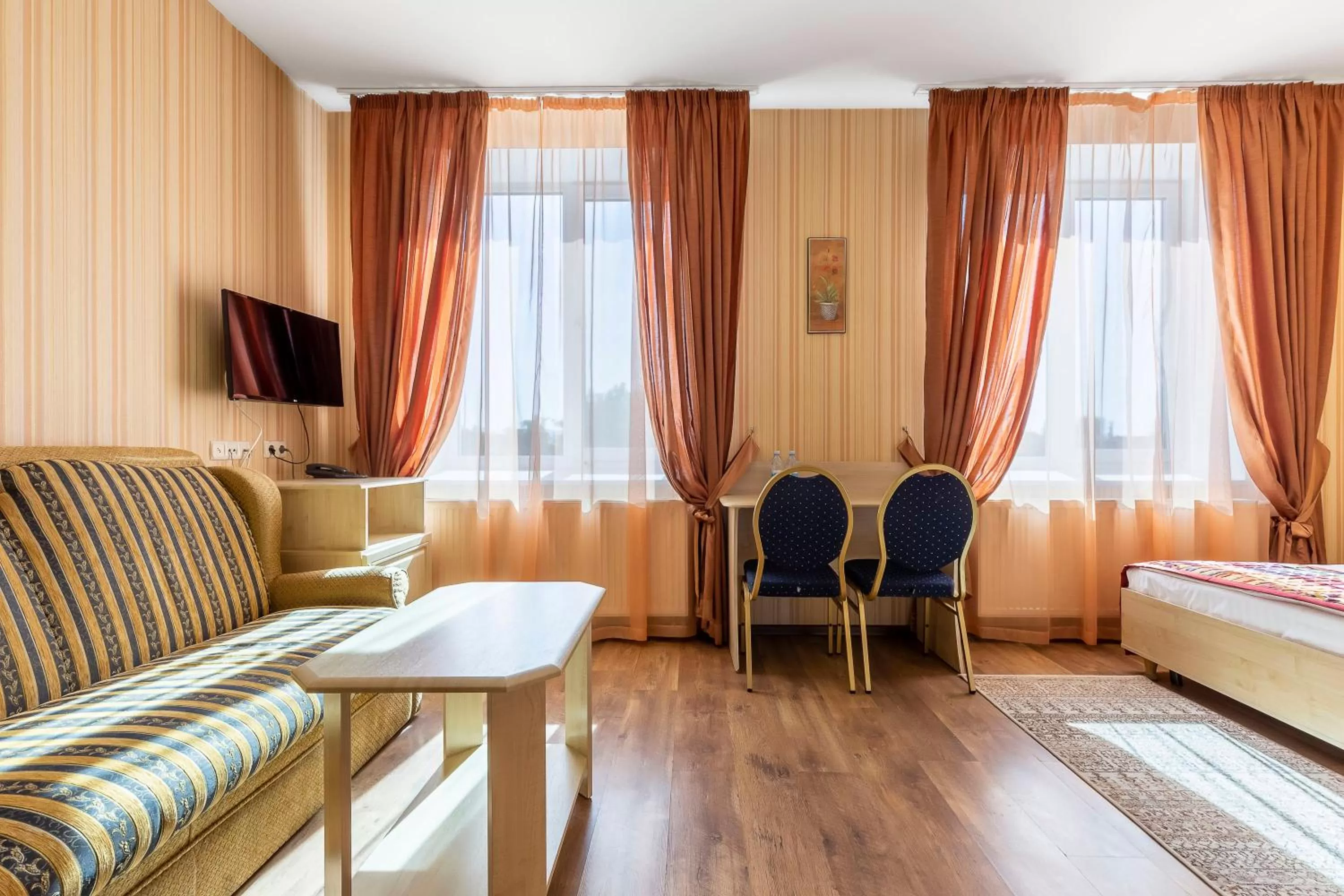 Bed, Seating Area in Гостиница Siesta Киев