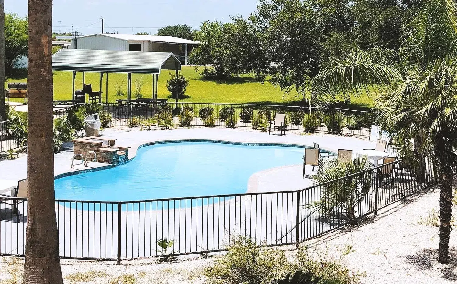 Pool view in Sky Palace Inn & Suites By Jasper Beeville Pool view in Sky Palace Inn & Suites By Jasper Beeville