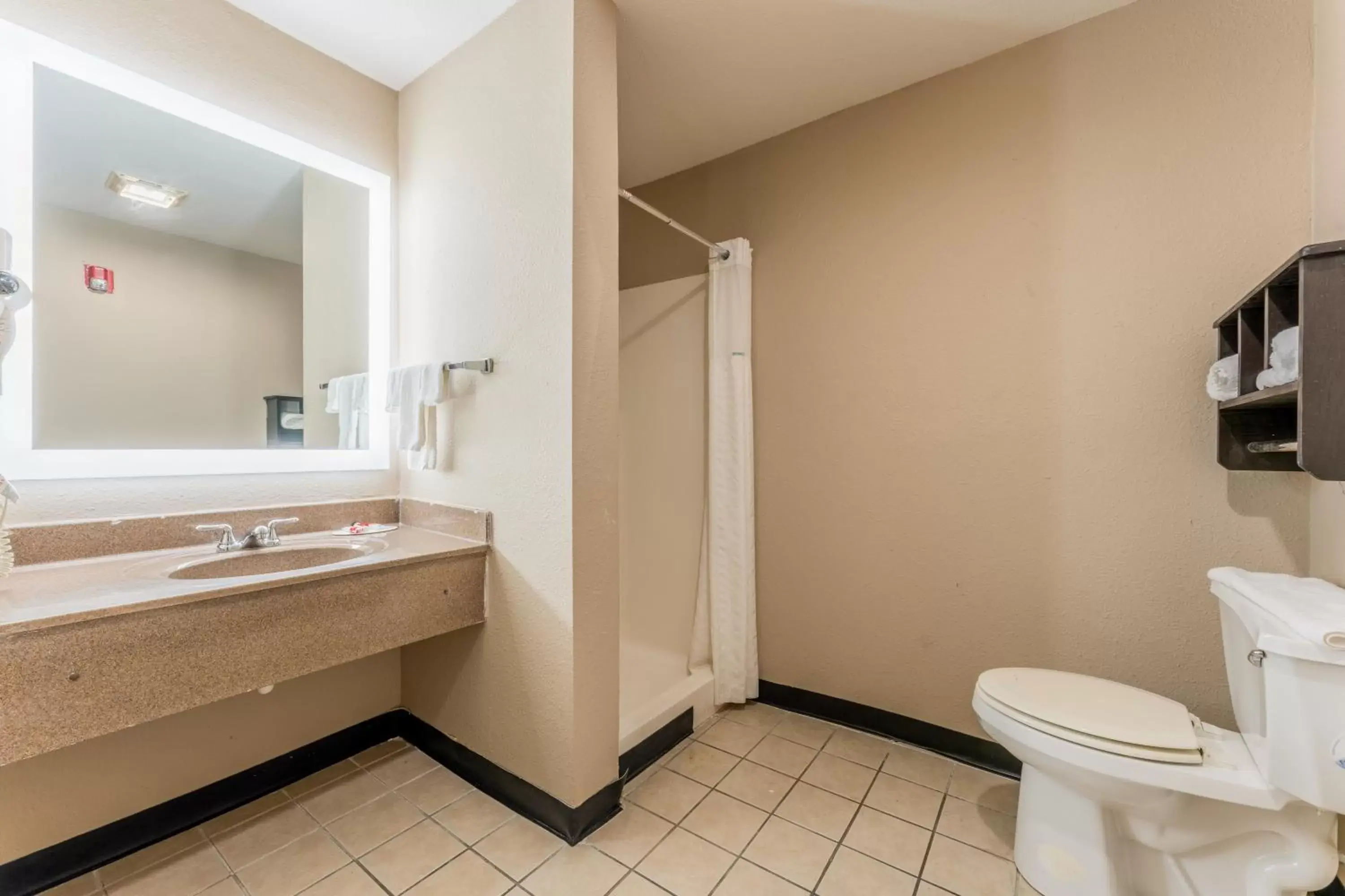 Bathroom in Super 8 by Wyndham Lake Charles Northeast