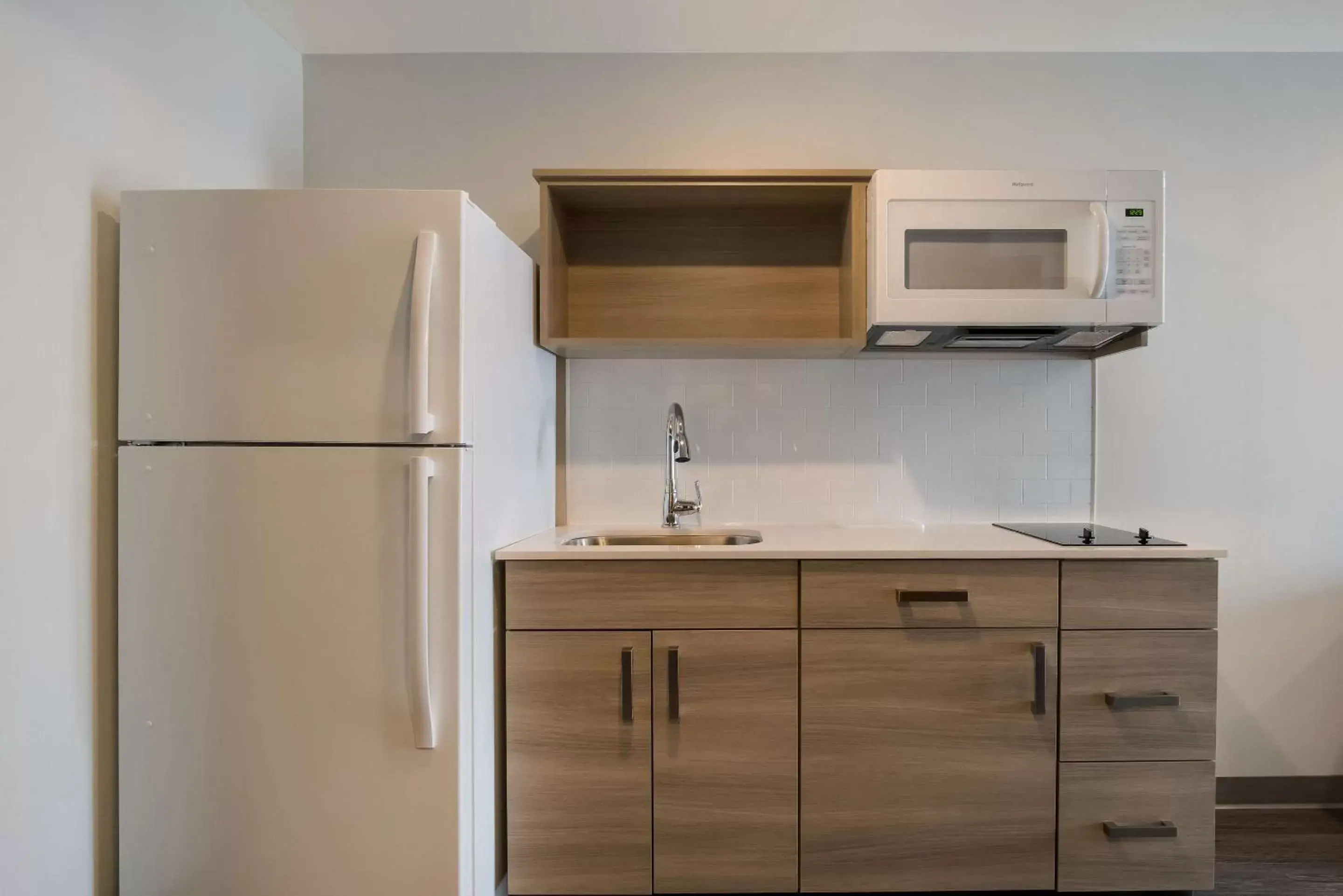 Kitchen or kitchenette, Kitchen/Kitchenette in WoodSpring Suites Grand Rapids Kentwood