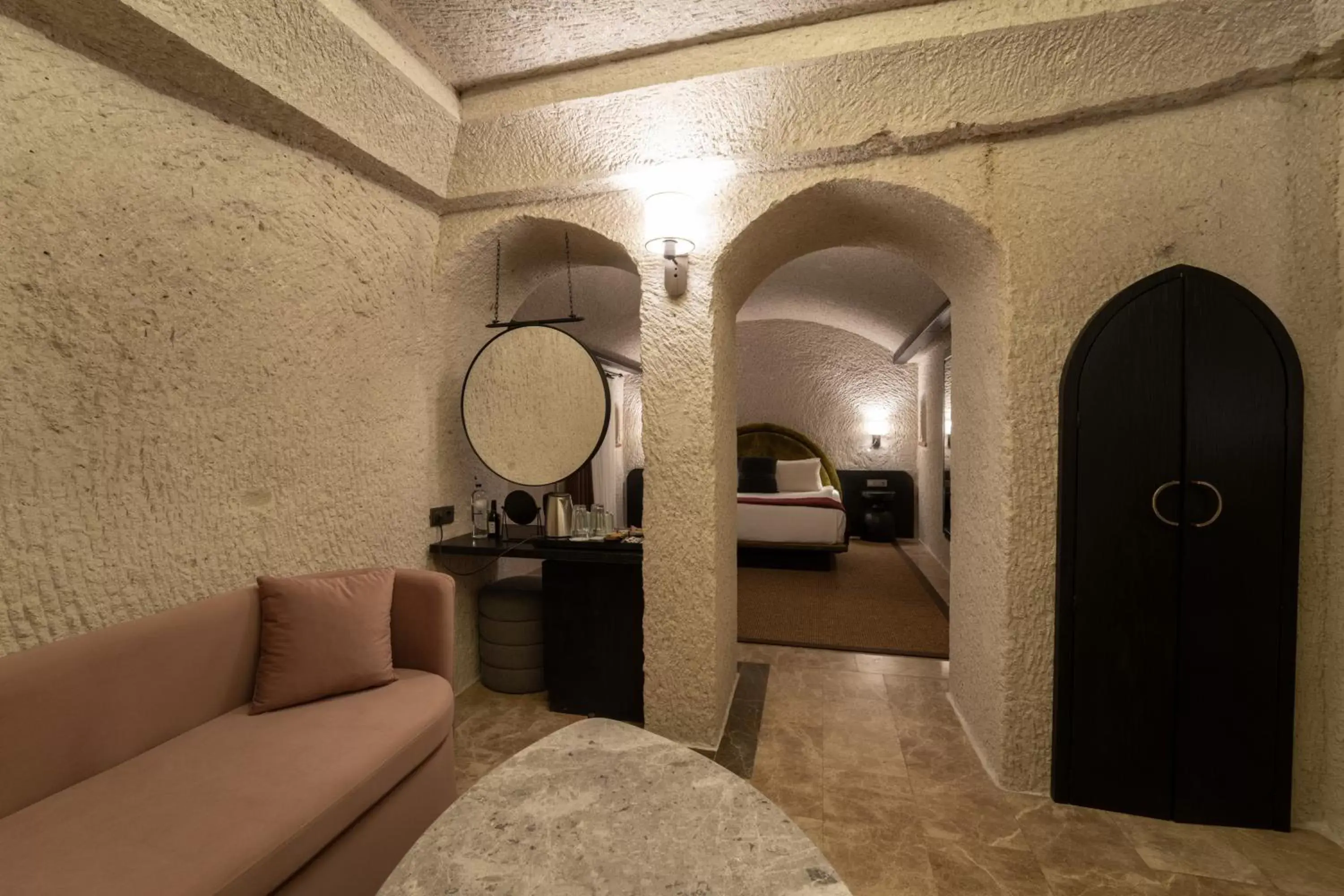 Seating area, Bathroom in Artemis Cave Suites & Spa- Adults Only