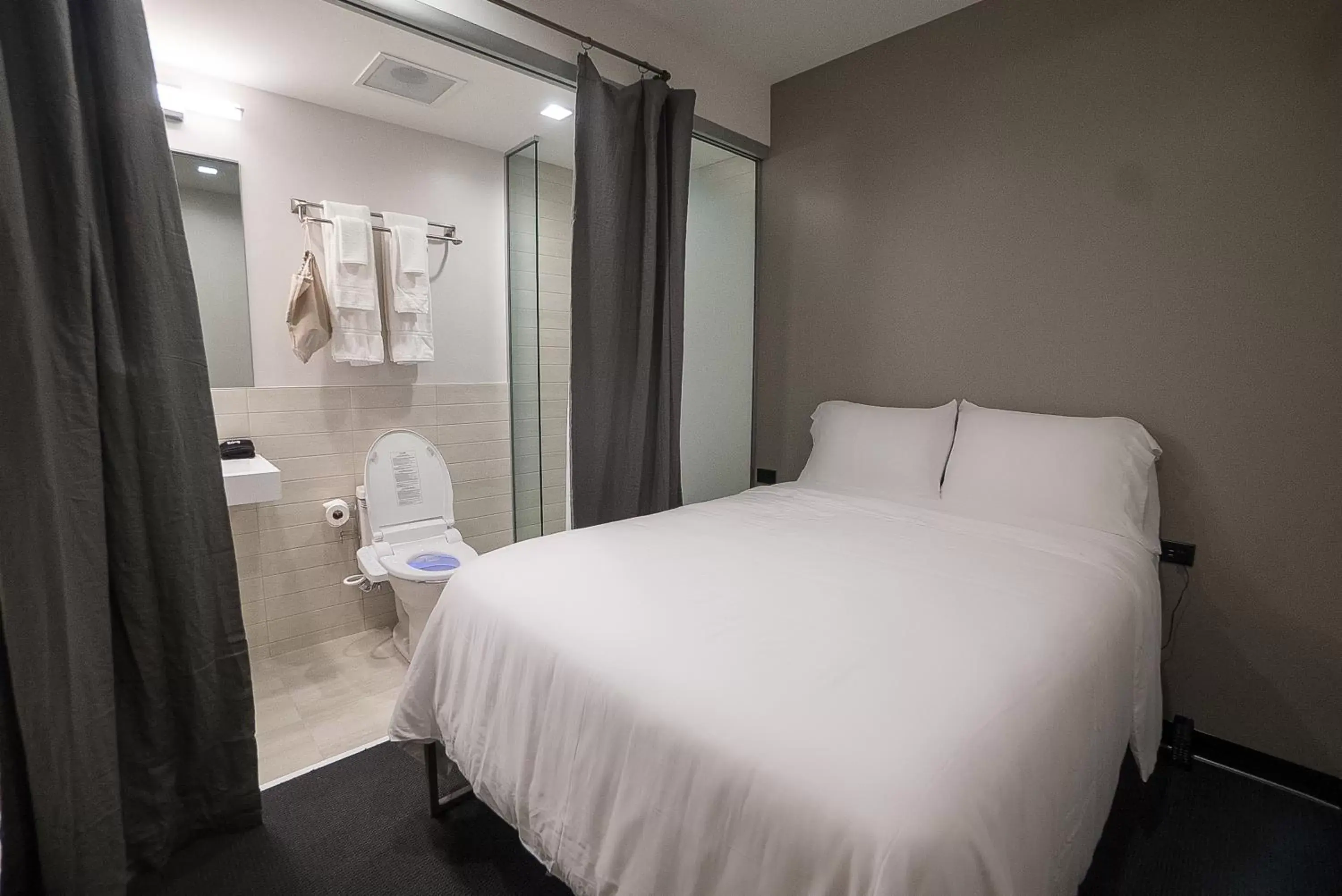 Bed in SOVA Micro-Room & Social Hotel