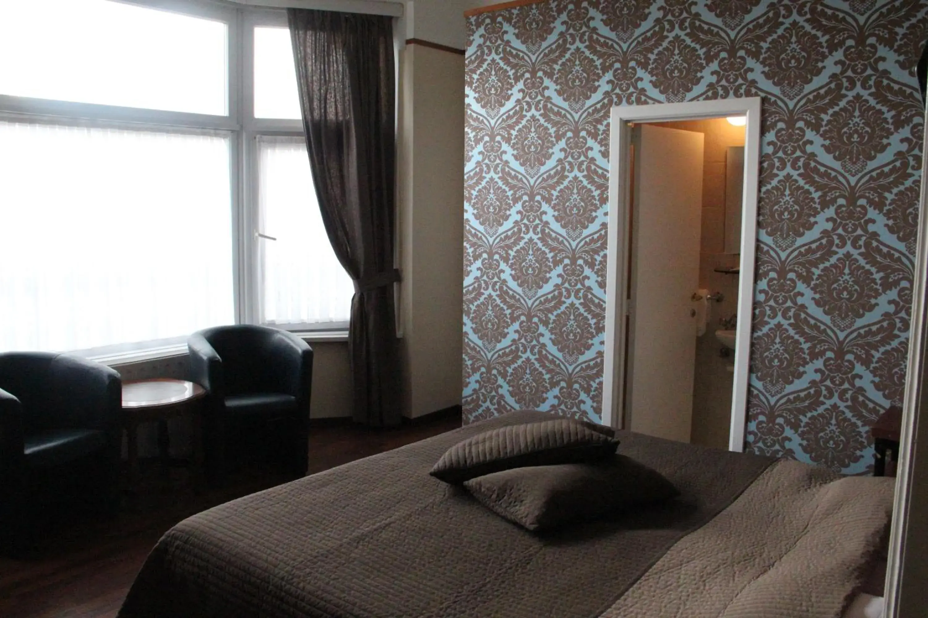 Bed in Hotel Antwerp Billard Palace