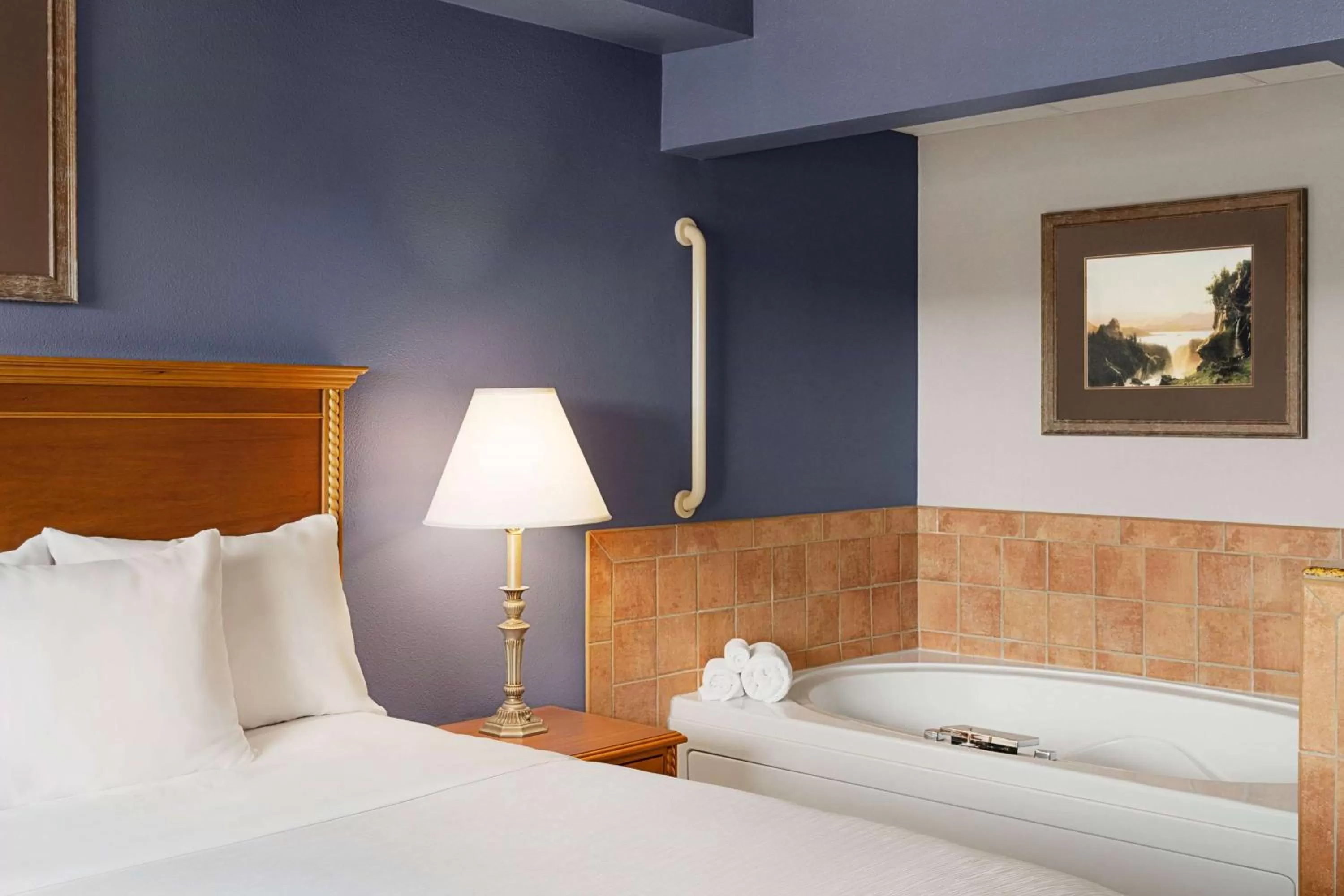 Photo of the whole room, Bed in AmericInn by Wyndham Laramie Near University of Wyoming