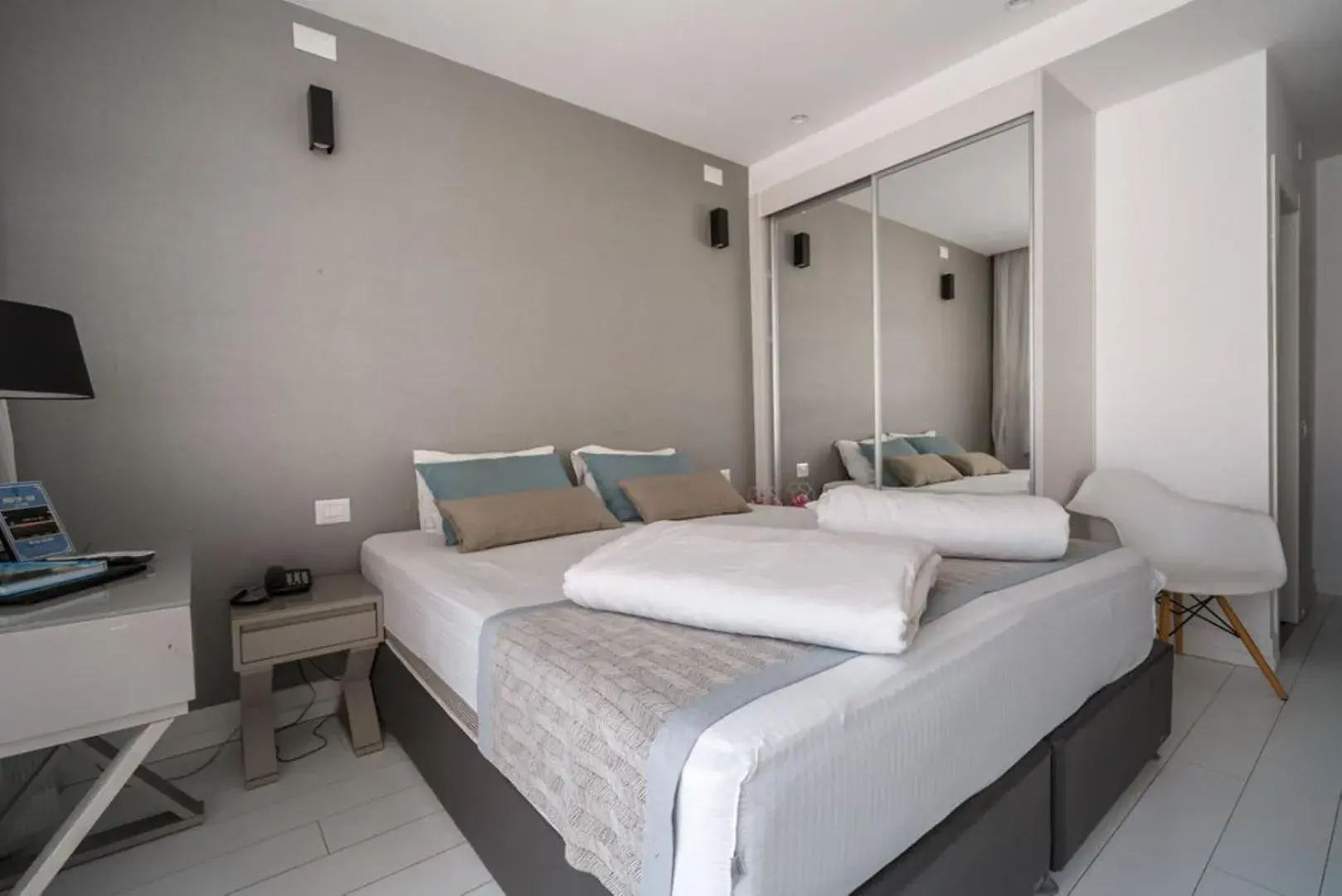 Bed in Kikar Boutique Hotel