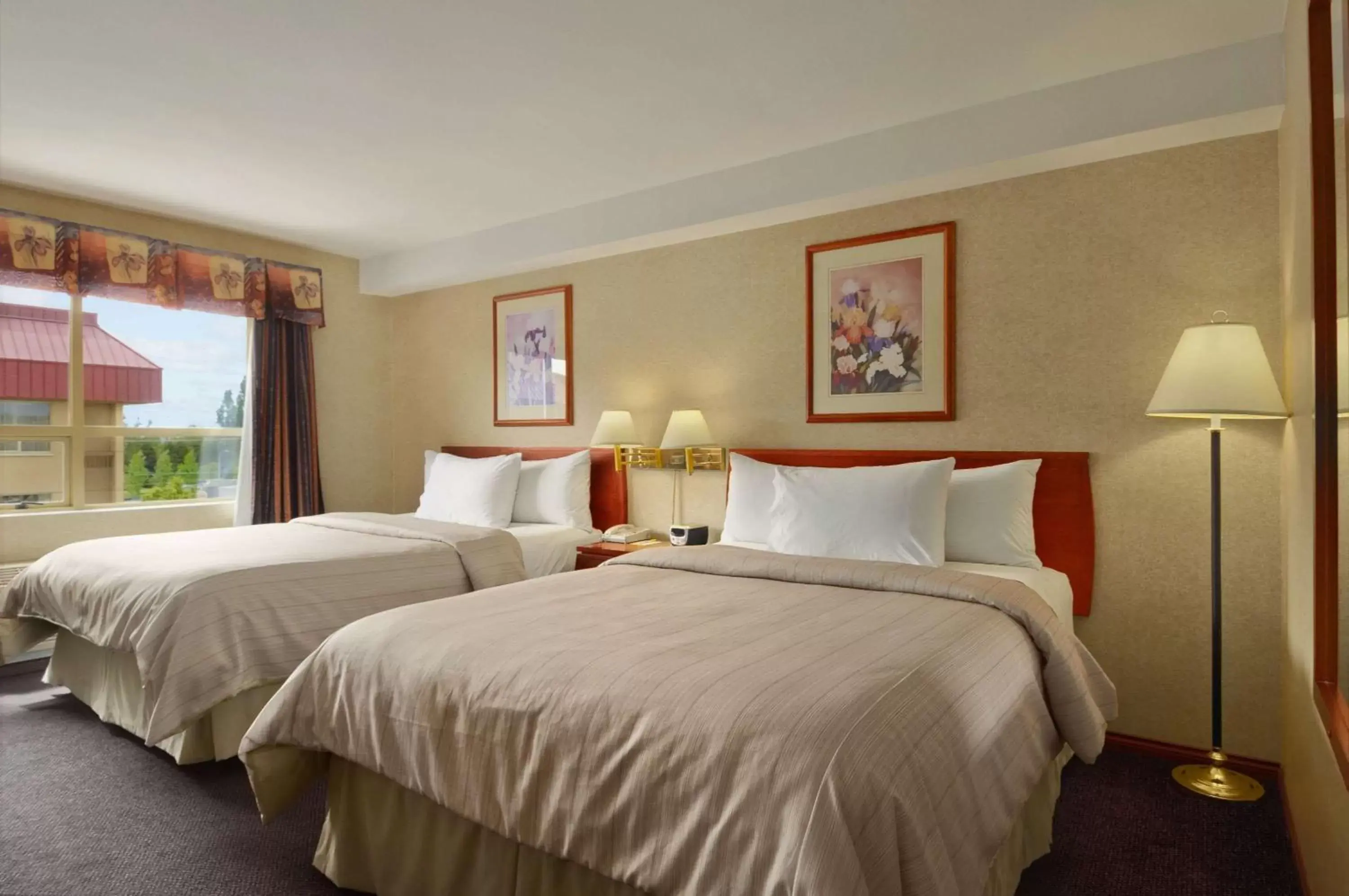 Photo of the whole room, Bed in Days Inn by Wyndham Vancouver Airport